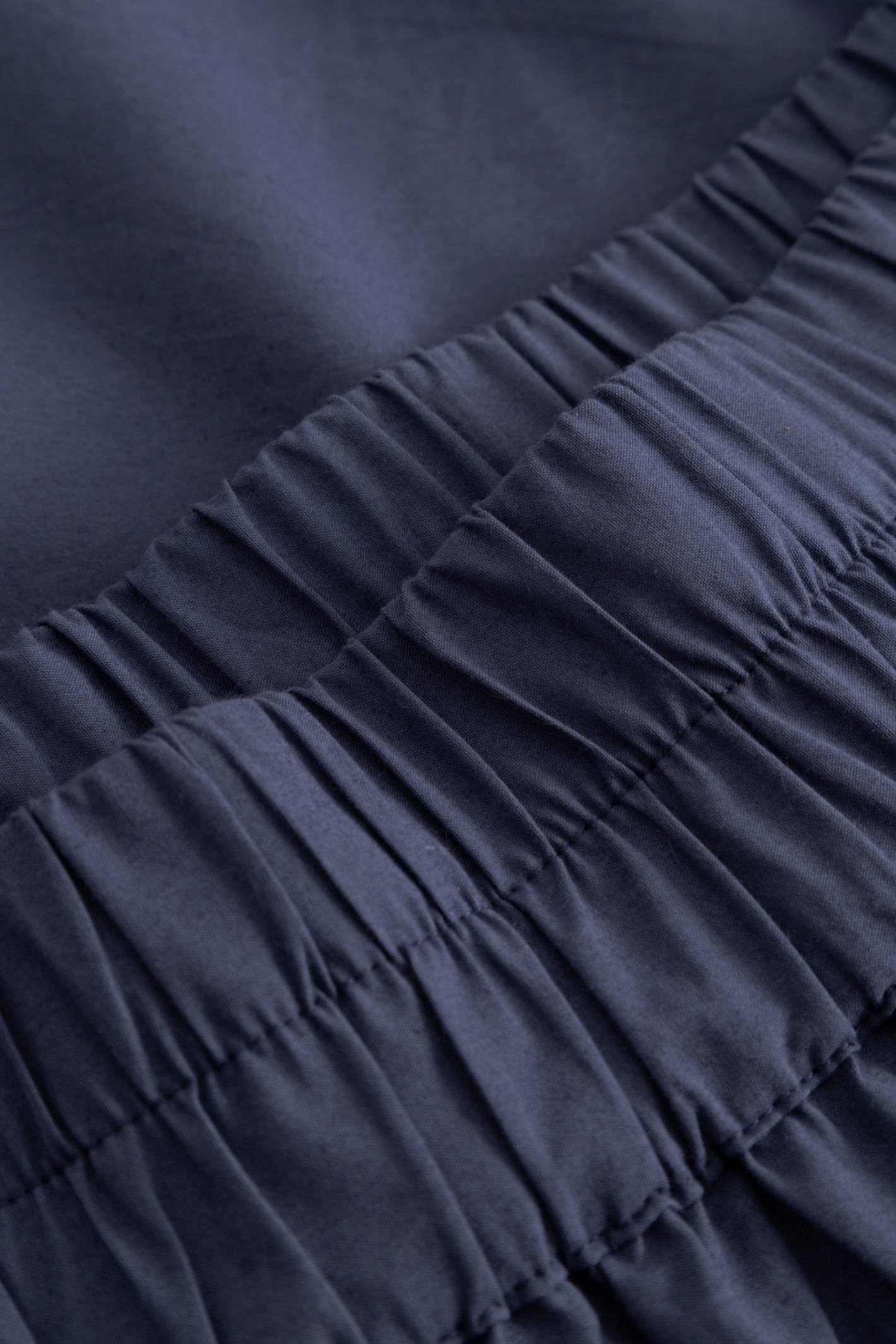 Noella dusty blue cotton skirt with elastic waistband and broderie anglaise hem