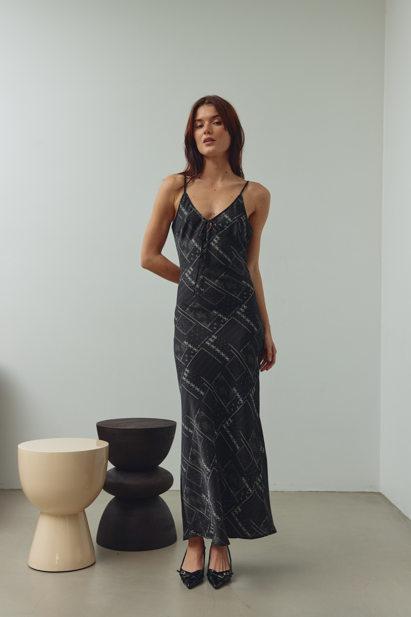 Noella black printed strappy dress with tie front detail and defined waist. Shop Noella at Dotique.