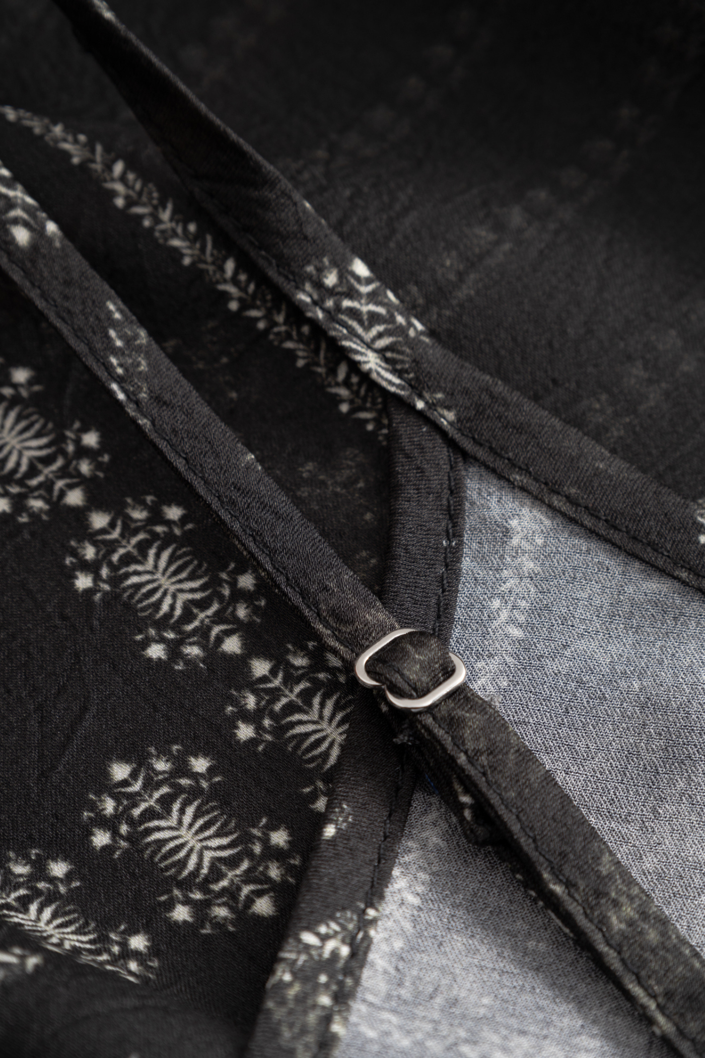 Noella black printed strappy dress with tie front detail and defined waist. Shop Noella at Dotique.