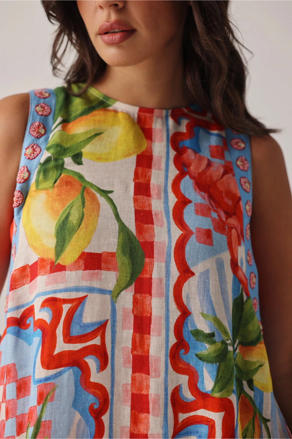 Close-up of vibrant pattern on NOIB Harper Mini Dress – Summer Zest by Noib, shop Noib collections at Dotique.