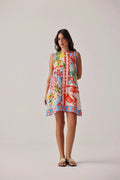 Woman wearing NOIB Harper Mini Dress – Summer Zest by Noib, shop Noib collections at Dotique with floral print and sleeveless design