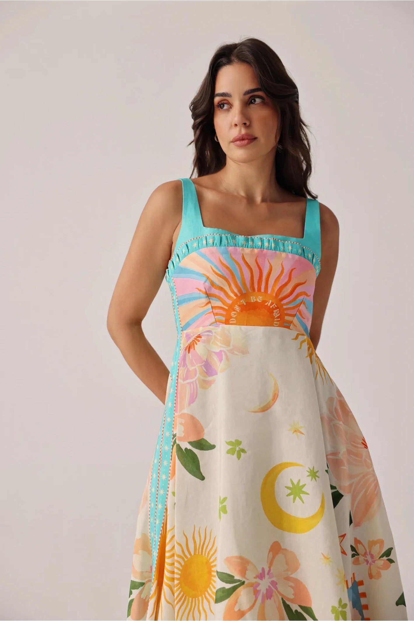 Model wearing NOIB Nora Midi Azure Print Viscose Linen Dress by Noib with celestial and floral motifs, shop Noib at Dotique