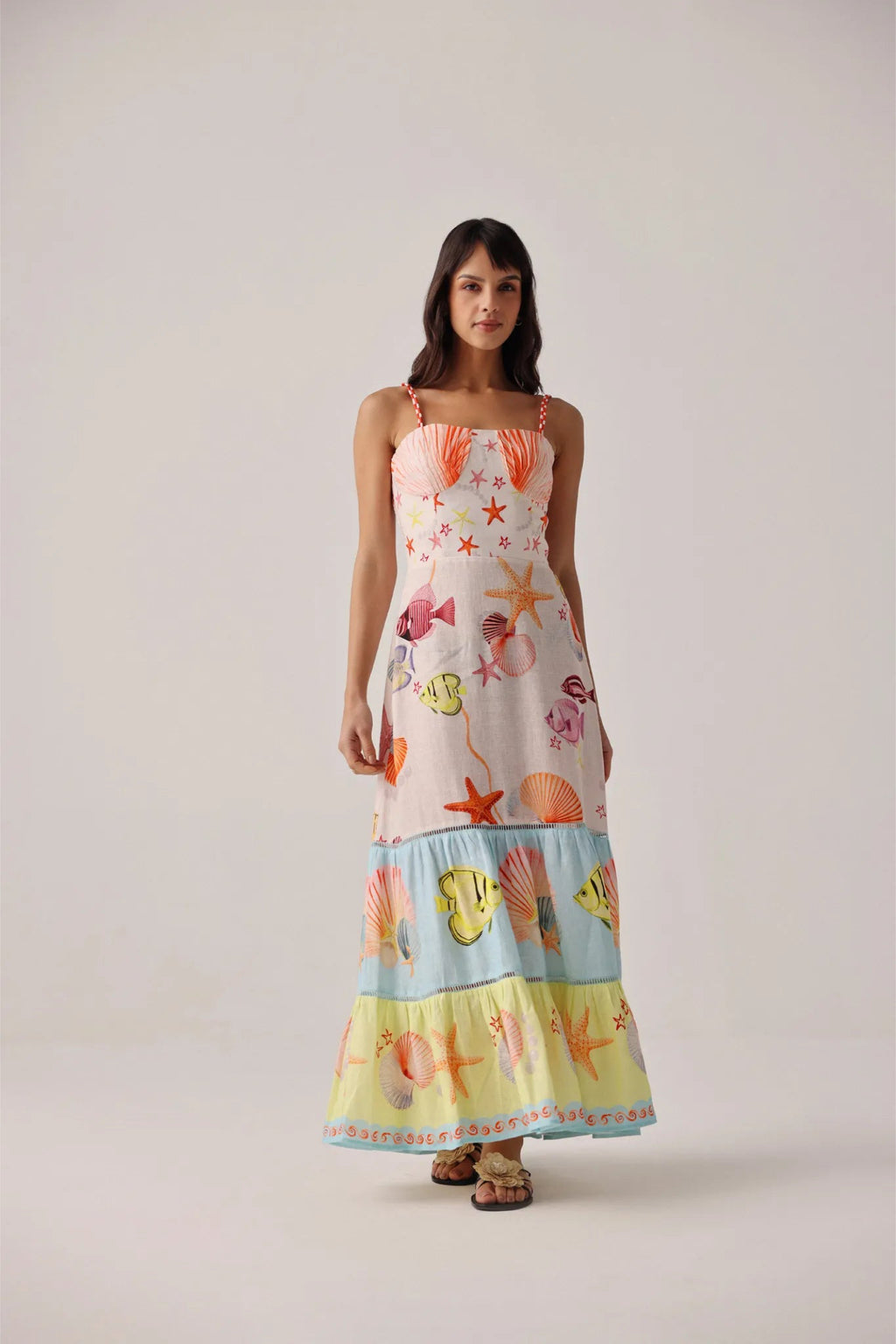 Model wearing NOIB Ruby Maxi Seaborn Dress by Noib with colorful marine print, shop Noib at Dotique