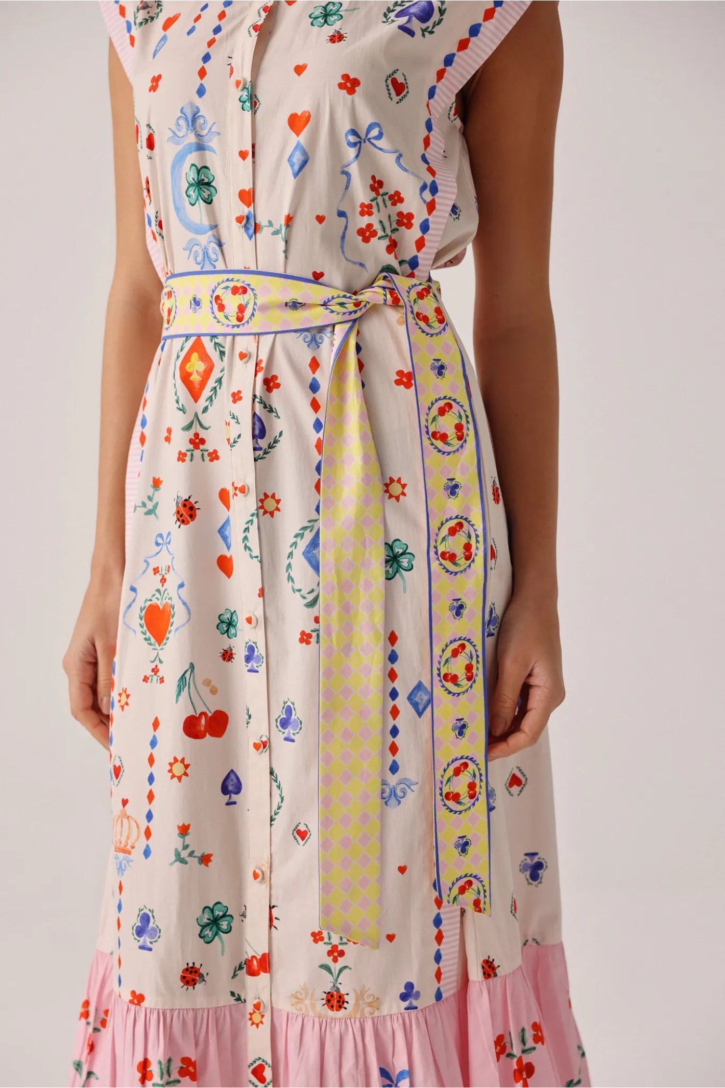 Model wearing NOIB Vega Maxi Tarot Dress by Noib with colorful tarot and floral motifs, shop Noib at Dotique