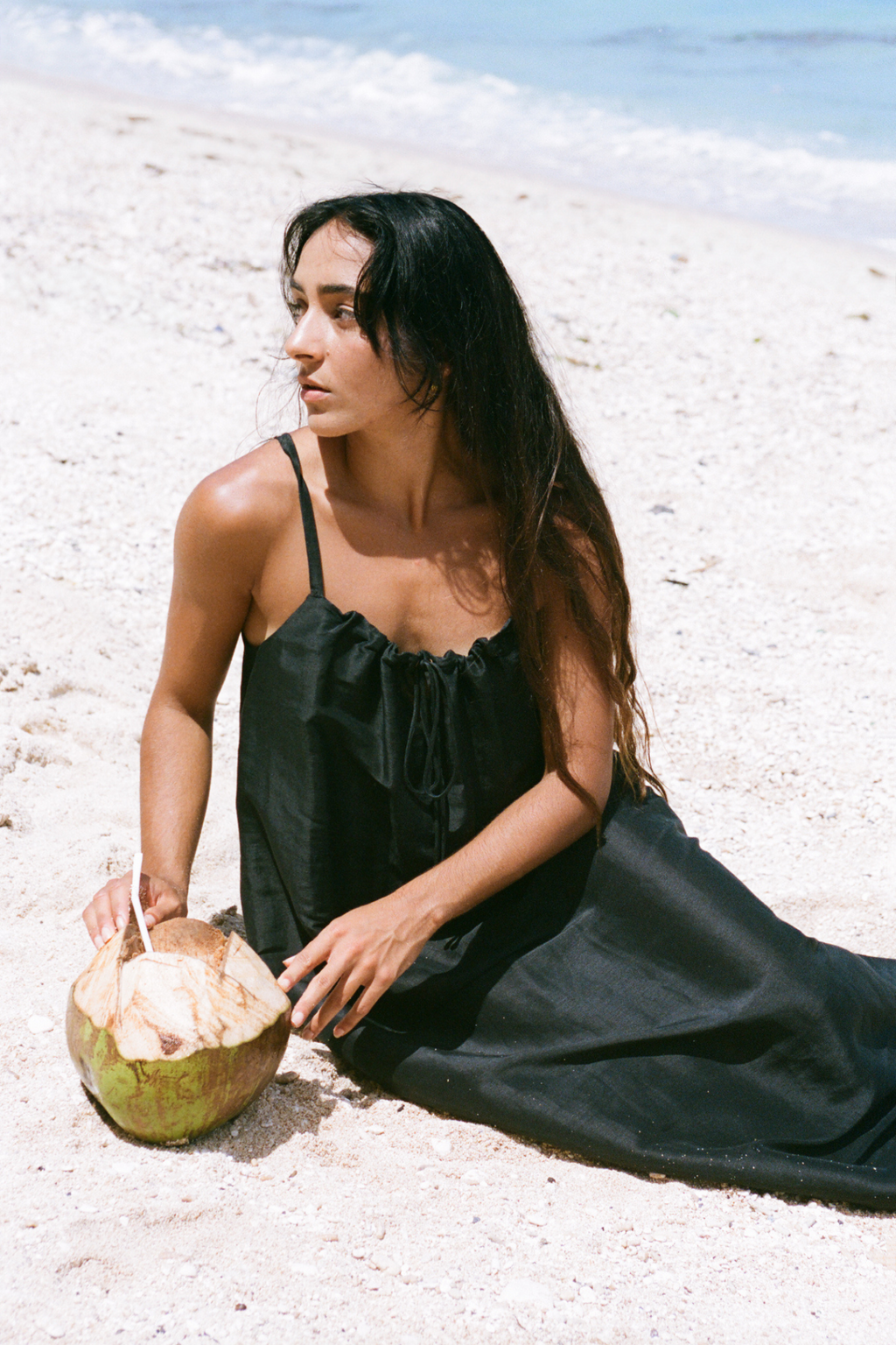 Woman wearing Lilly Pilly LP-D004 Nova Linen Silk Dress Black by Lilly Pilly, shop the vendor at Dotique on the beach.