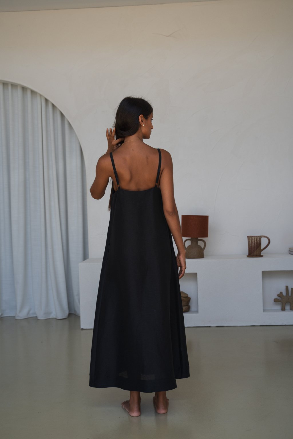 Woman wearing Lilly Pilly LP-D004 Nova Linen Silk Dress Black by Lilly Pilly, shop Lilly Pilly at Dotique online.