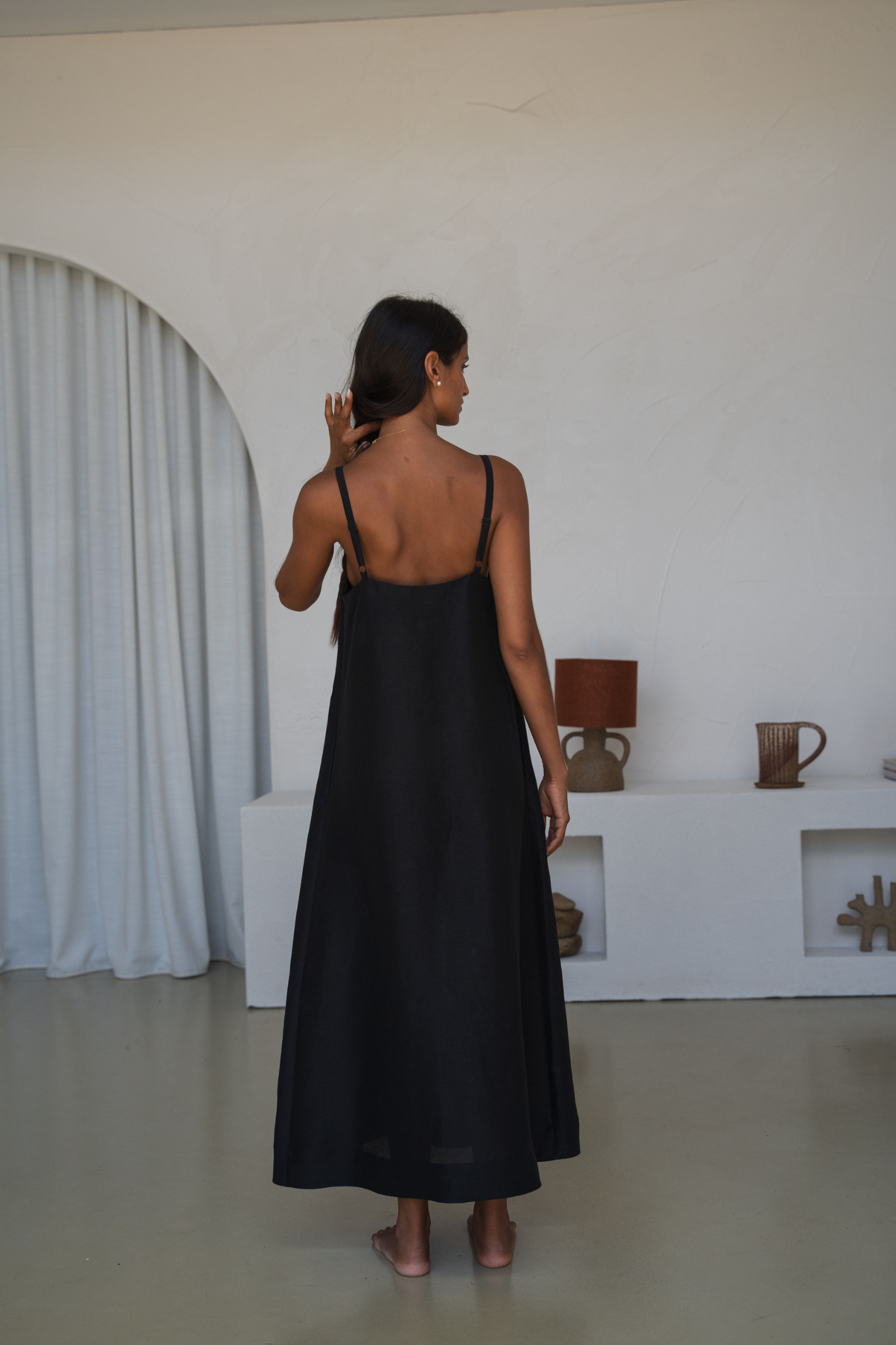 Woman wearing Lilly Pilly LP-D004 Nova Linen Silk Dress Black by Lilly Pilly, shop Lilly Pilly at Dotique online.