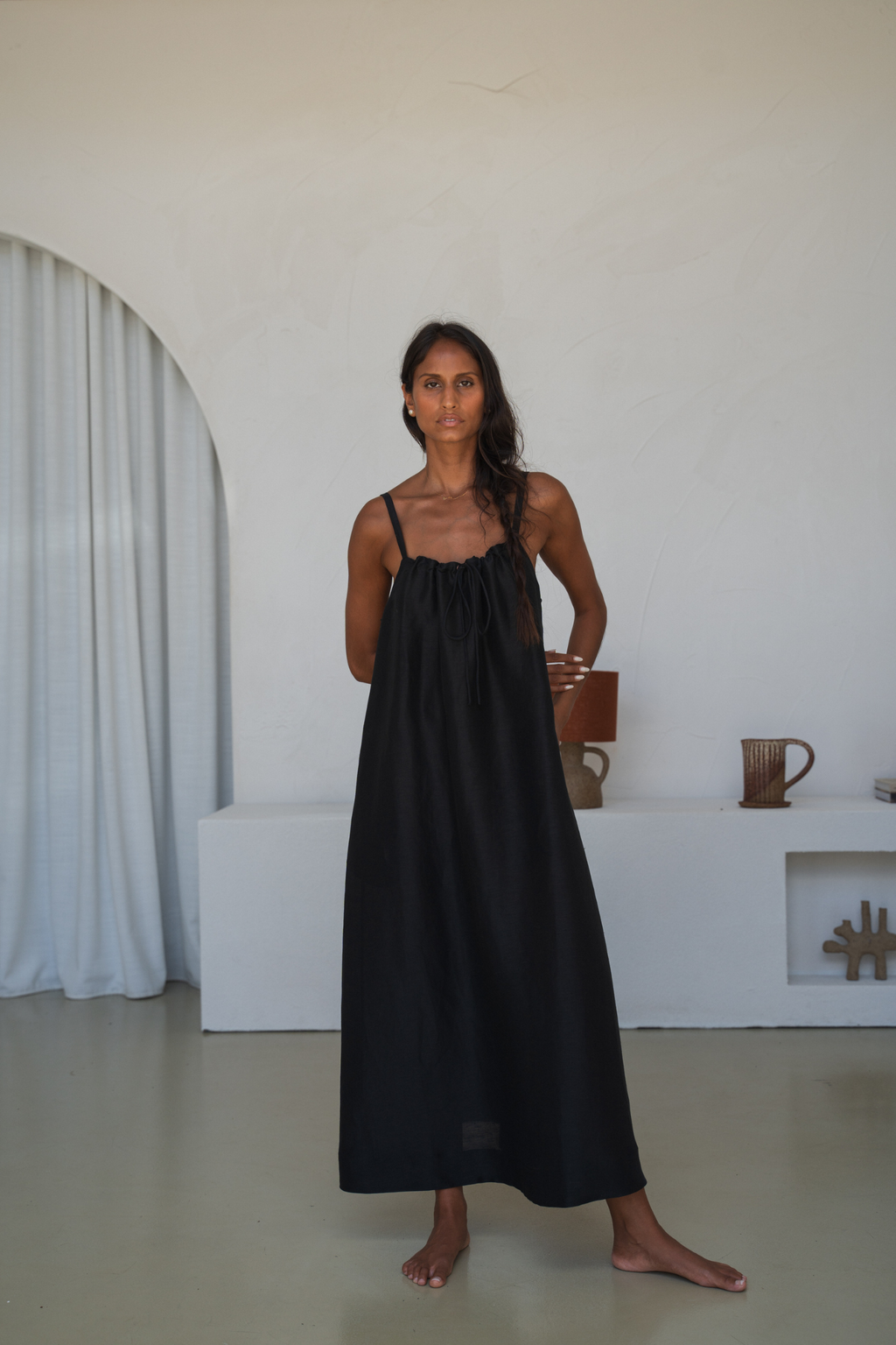 Woman wearing Lilly Pilly LP-D004 Nova Linen Silk Dress Black by Lilly Pilly, shop Lilly Pilly at Dotique.