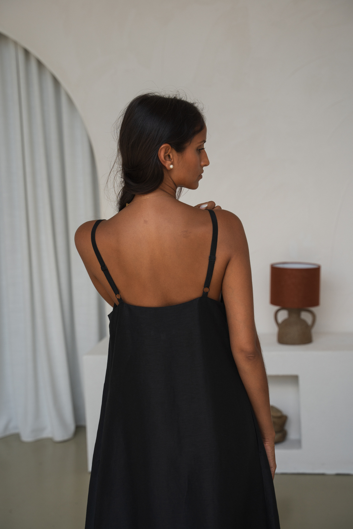 Woman wearing Lilly Pilly LP-D004 Nova Linen Silk Dress Black by Lilly Pilly, Shop Lilly Pilly at Dotique online.