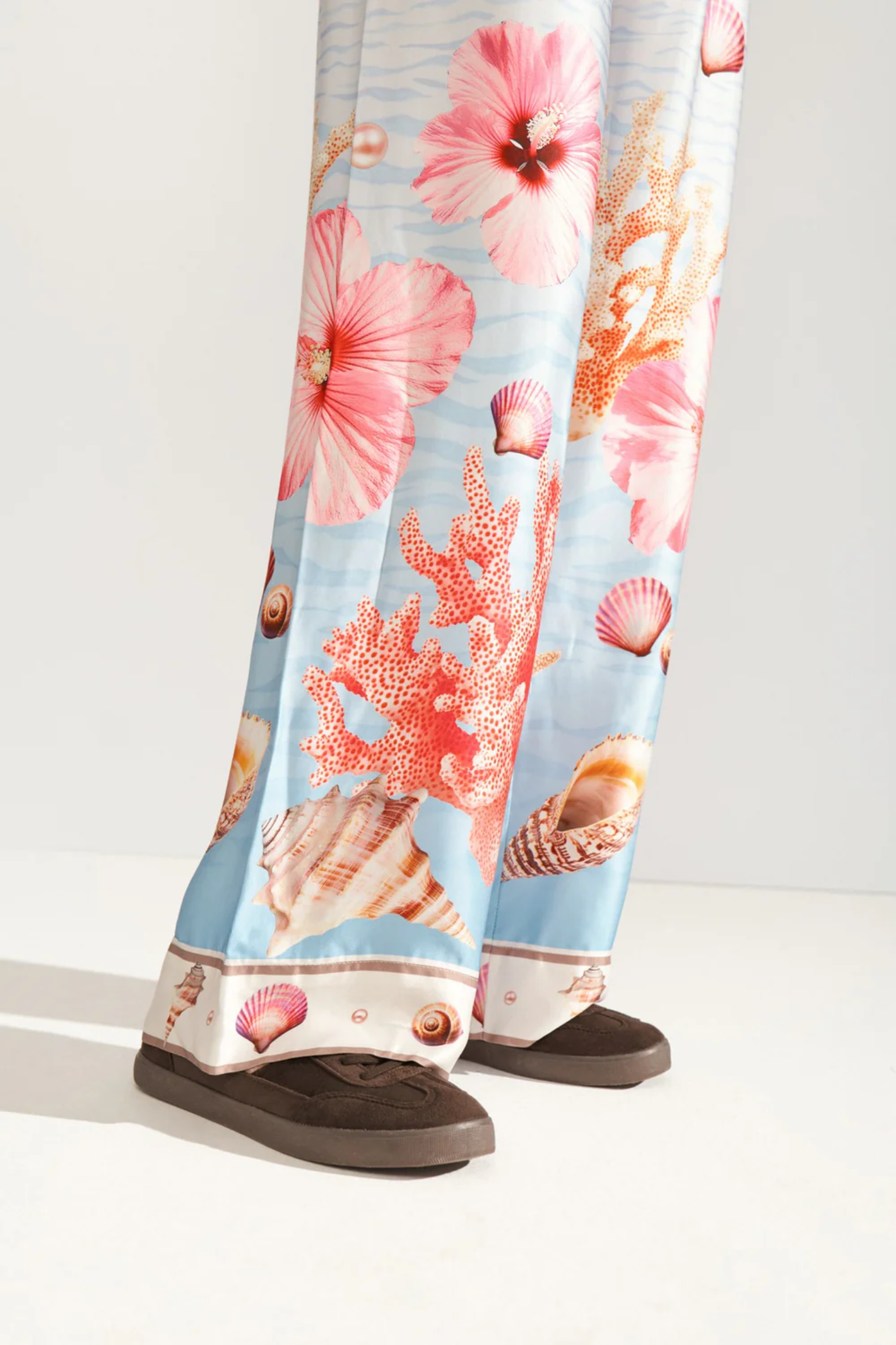 Close-up of Numph 707149 Nuoceana Wide Leg Trousers – Skyway with coral and shell prints by Numph, shop Numph at Dotique.