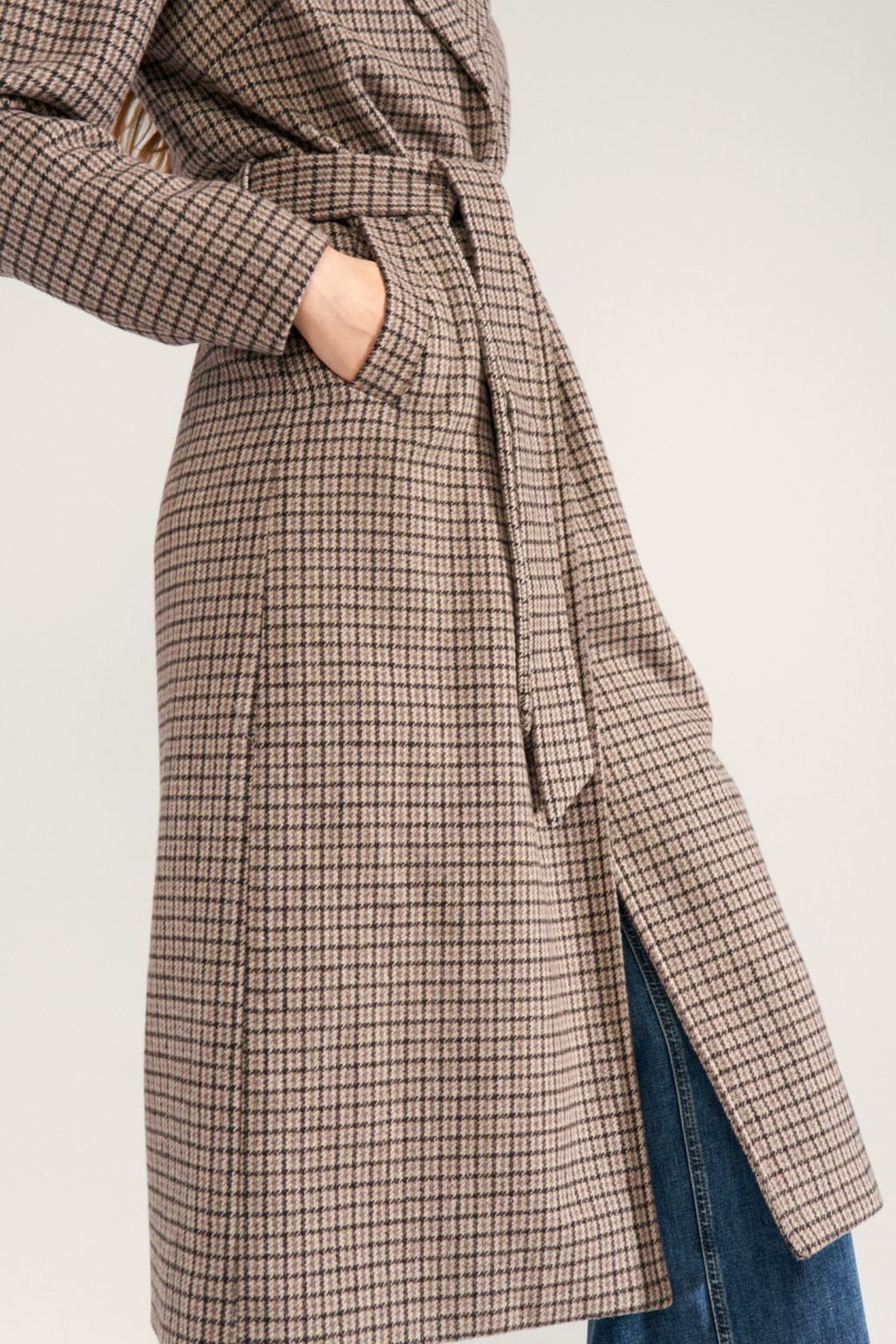 Shop the Nümph NUELANA Coat in Black Coffee at Dotique. A long checked wool-blend coat with a tie waist, perfect for autumn and winter layering.