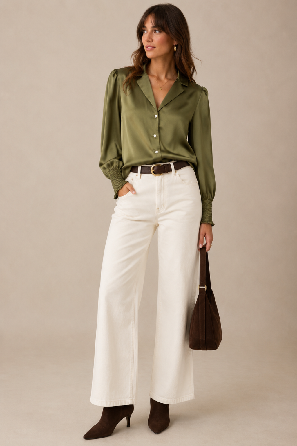 Shop the Nümph Nusitas Shirt in Calla Green at Dotique. A satin-look green shirt with an open collar, button front and feminine shirred cuffs.