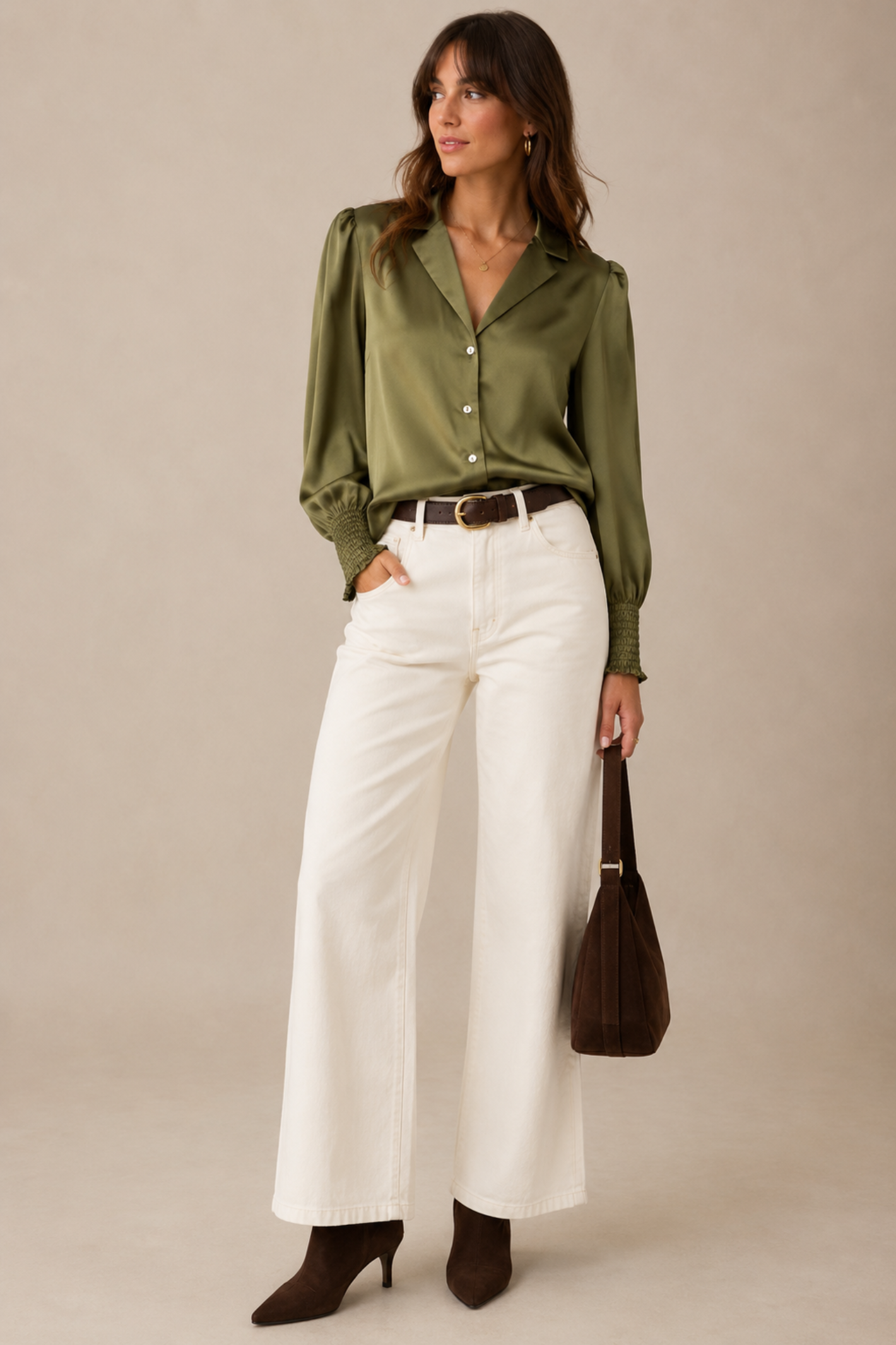 Shop the Nümph Nusitas Shirt in Calla Green at Dotique. A satin-look green shirt with an open collar, button front and feminine shirred cuffs.