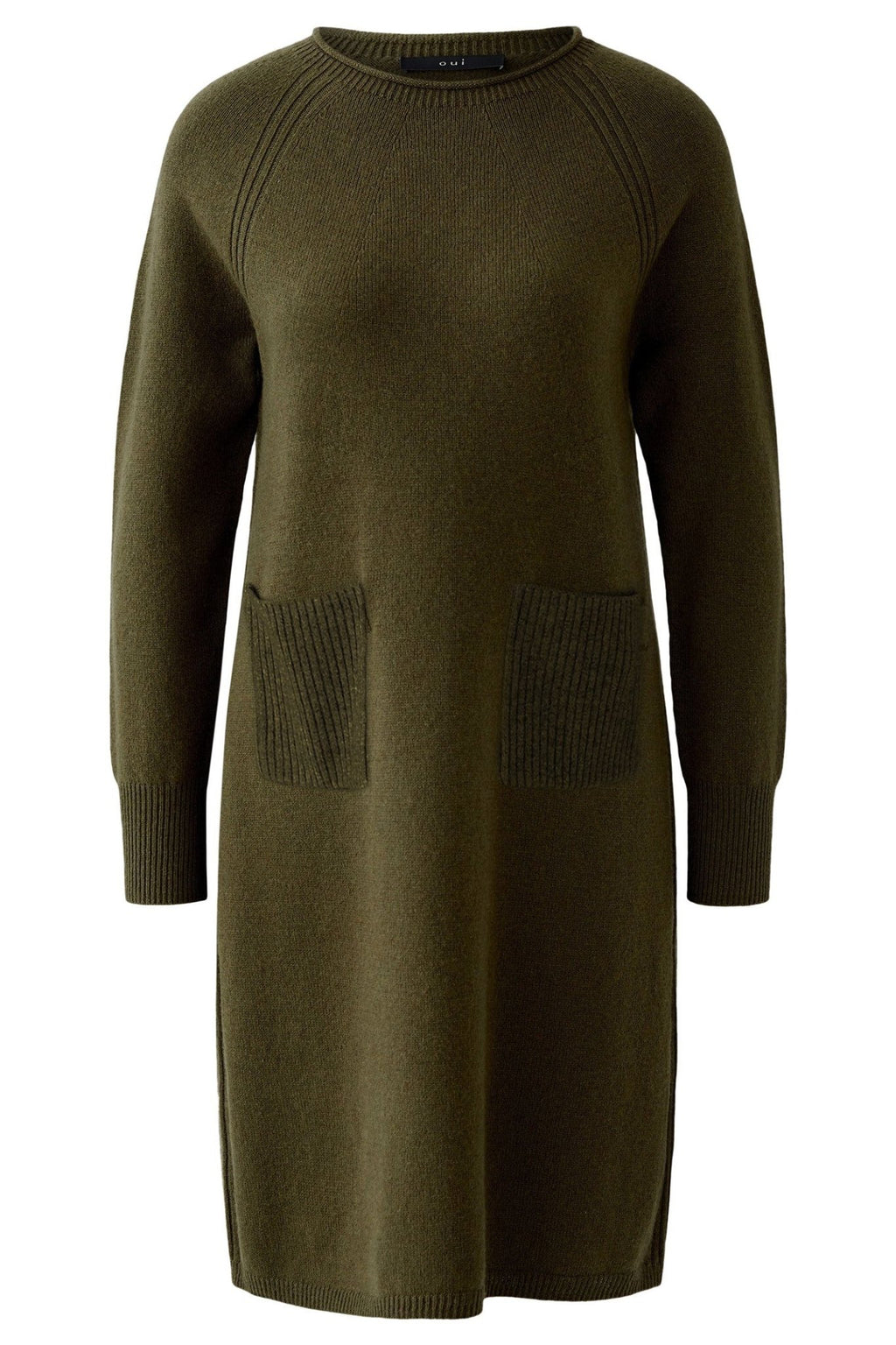 Green sweater dress on a white background