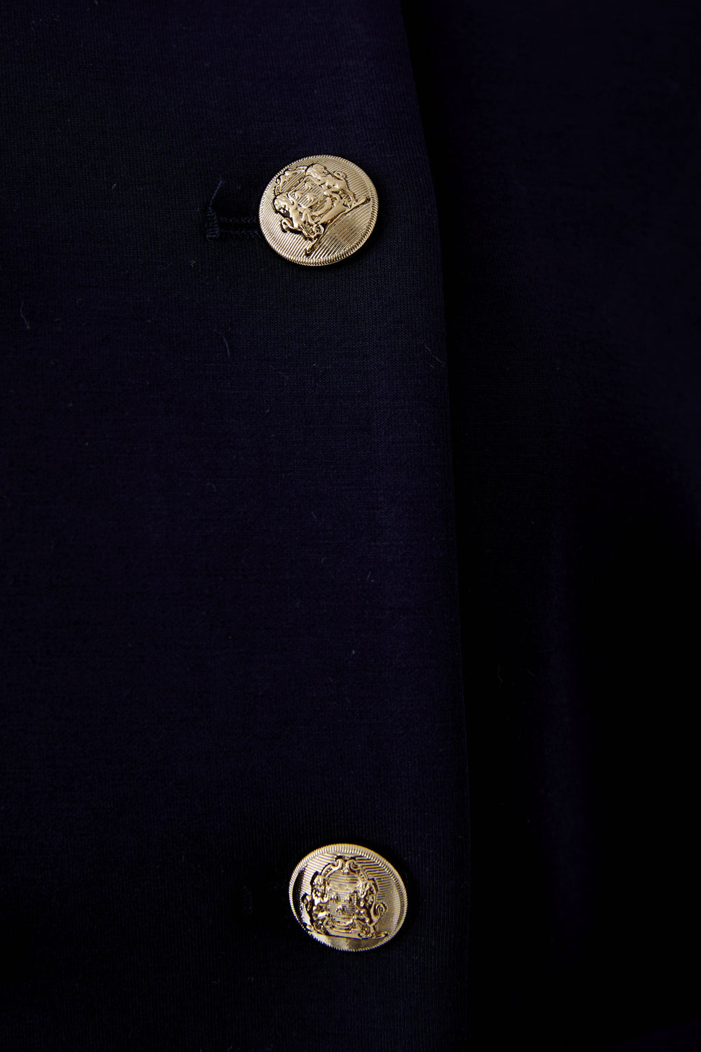 Close-up of gold emblem buttons on Oui 96341 Navy Blue Collarless Jacket with Gold Buttons by Oui Shop Oui at Dotique