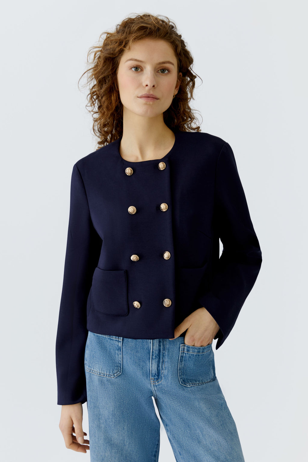 Model wearing Oui 96341 Navy Blue Collarless Jacket with Gold Buttons by Oui Shop Oui at Dotique for chic layering looks