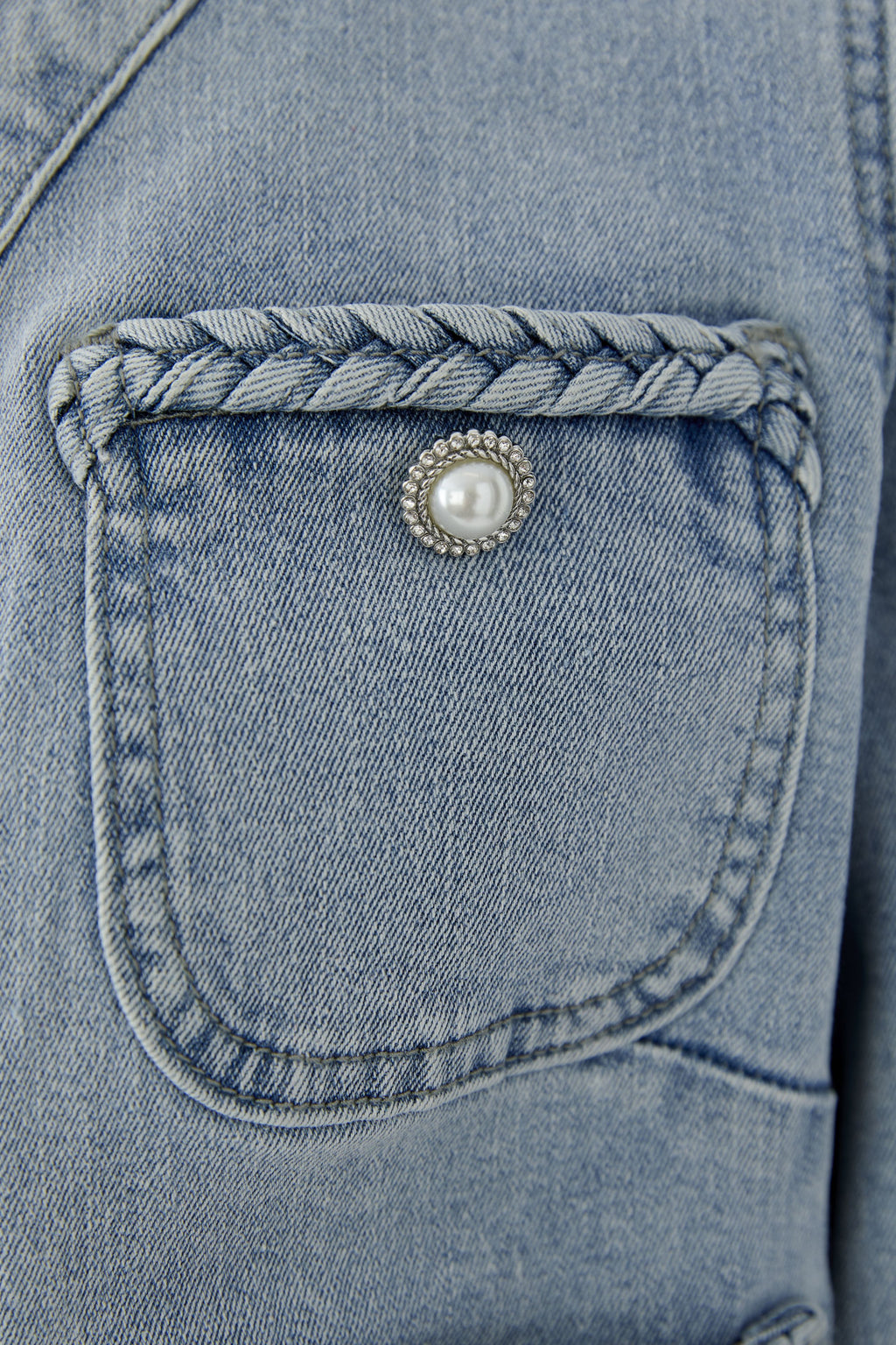 Close-up of pocket with braided trim and pearl button on Oui 96342 Light Denim Jacket by Oui shop Oui at Dotique