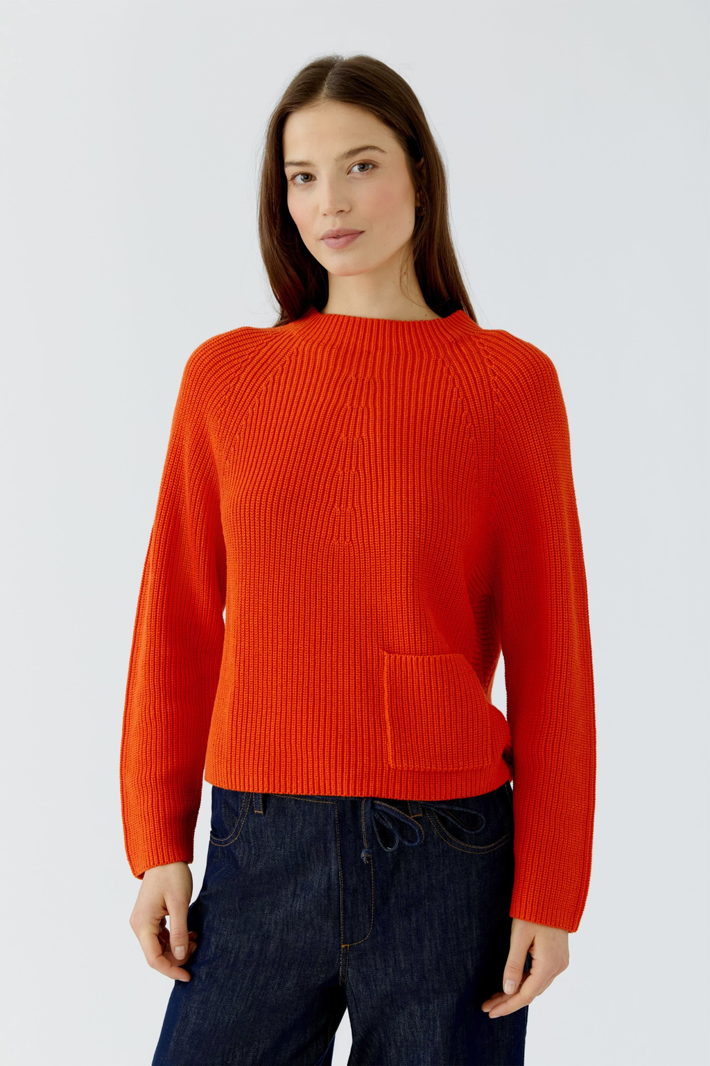 Oui Riya round neck knit jumper in Orangeade with a relaxed fit and long sleeves. Shop now at Dotique.