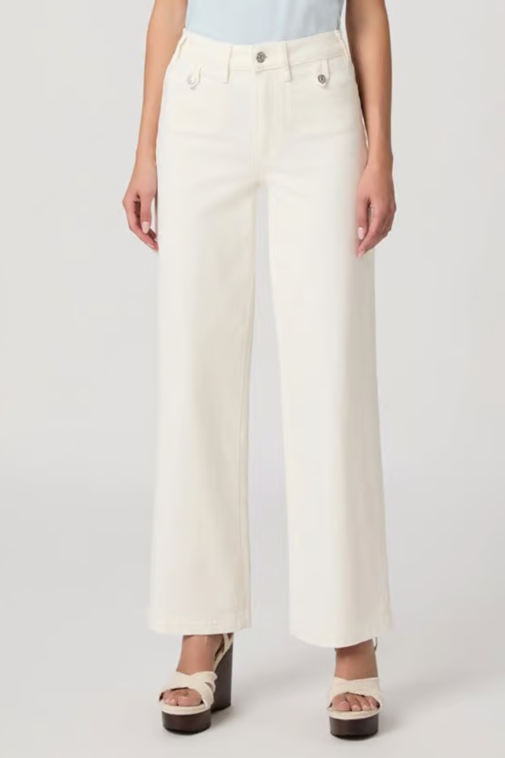 Front view of a model wearing PAIGE Anessa 31" High Rise Wide Leg Jeans Tonal Ecru by PAIGE with a high waist and wide-leg silhouette. Shop PAIGE at Dotique.