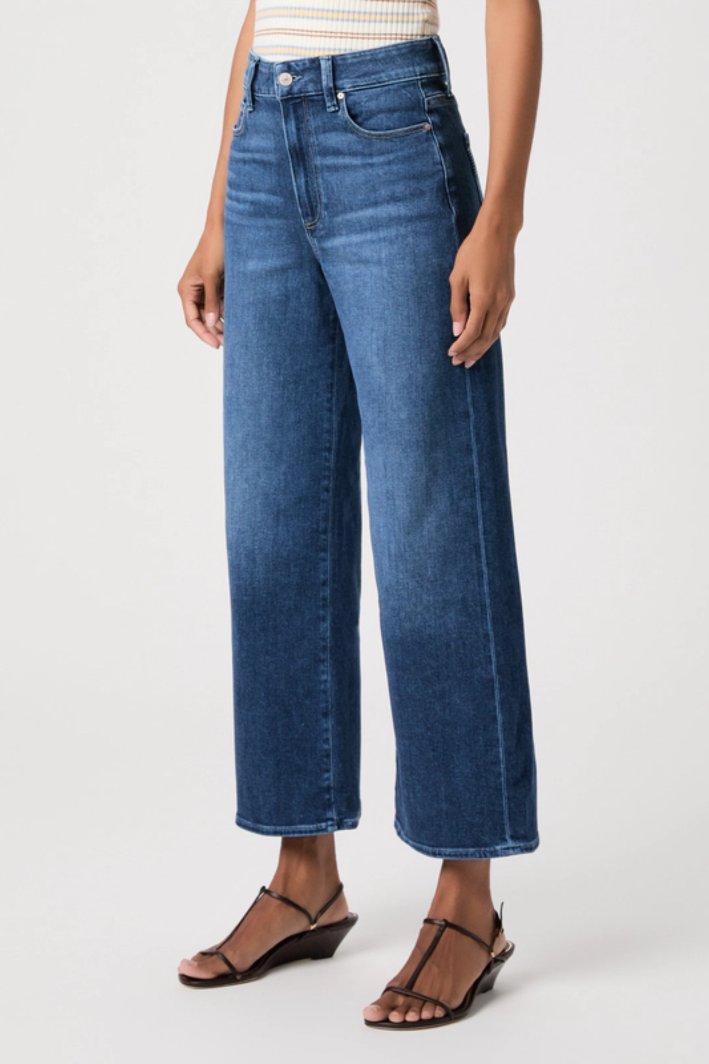 Shop the PAIGE Anessa Reverse Seamed Beltloops Jeans in Beachline at Dotique. High-rise wide-leg jeans in premium PAIGE VINTAGE denim with a fresh light wash and contemporary detailing.