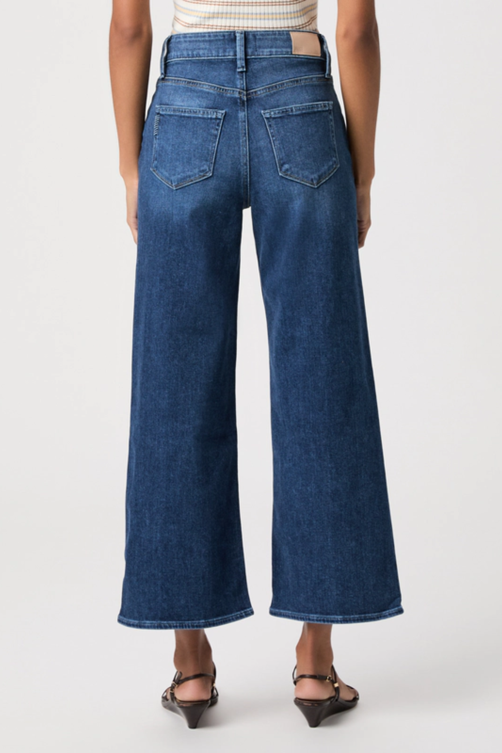Shop the PAIGE Anessa Reverse Seamed Beltloops Jeans in Beachline at Dotique. High-rise wide-leg jeans in premium PAIGE VINTAGE denim with a fresh light wash and contemporary detailing.