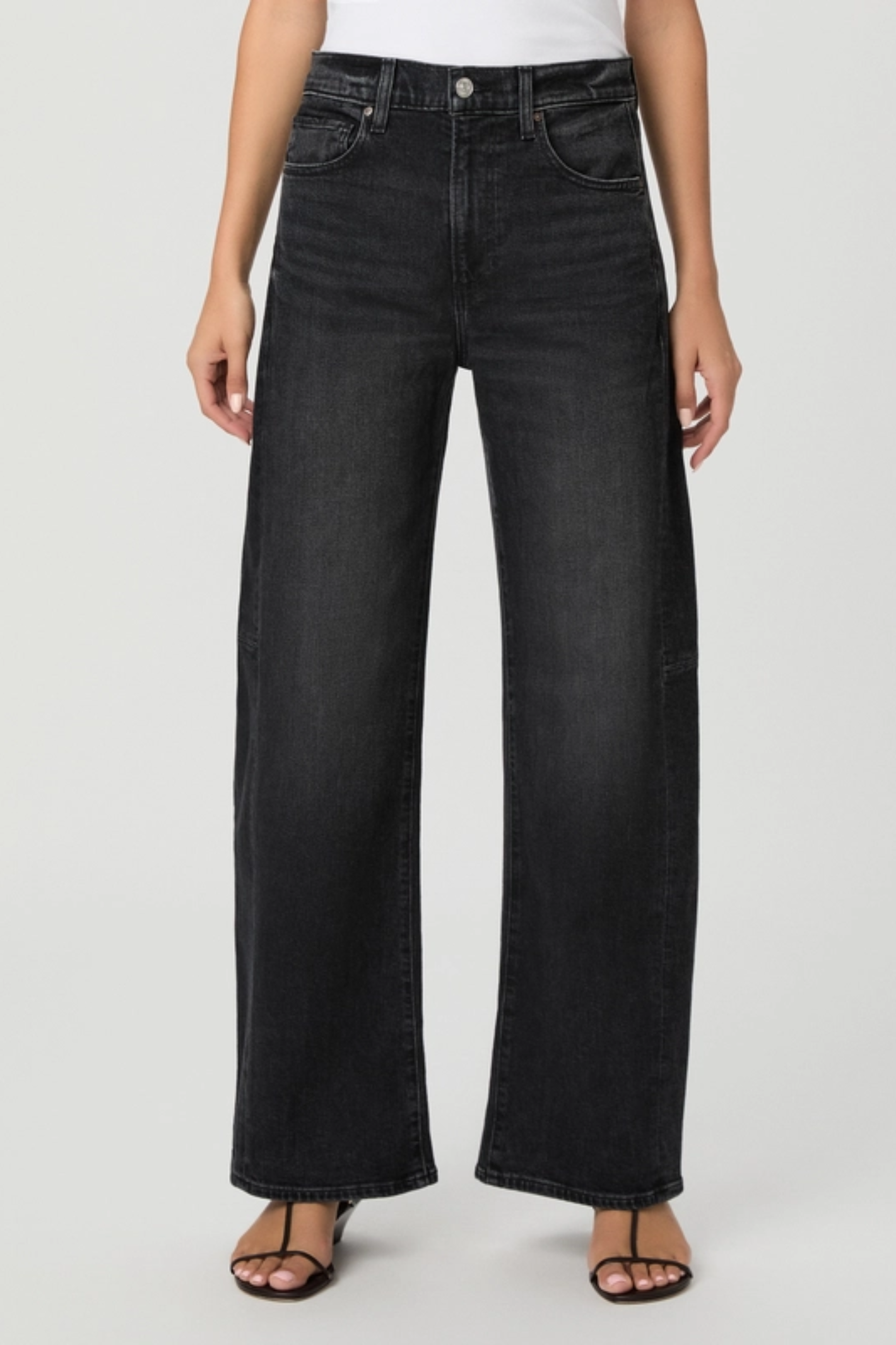 Shop the PAIGE Arellia Skimmer Jeans in Oscura at Dotique. High-rise barrel-leg jeans with flattering outseam panels, premium denim and a versatile dark wash.