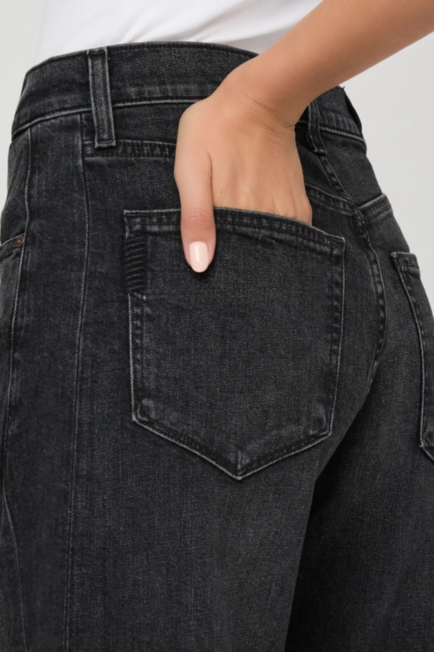 Shop the PAIGE Arellia Skimmer Jeans in Oscura at Dotique. High-rise barrel-leg jeans with flattering outseam panels, premium denim and a versatile dark wash.