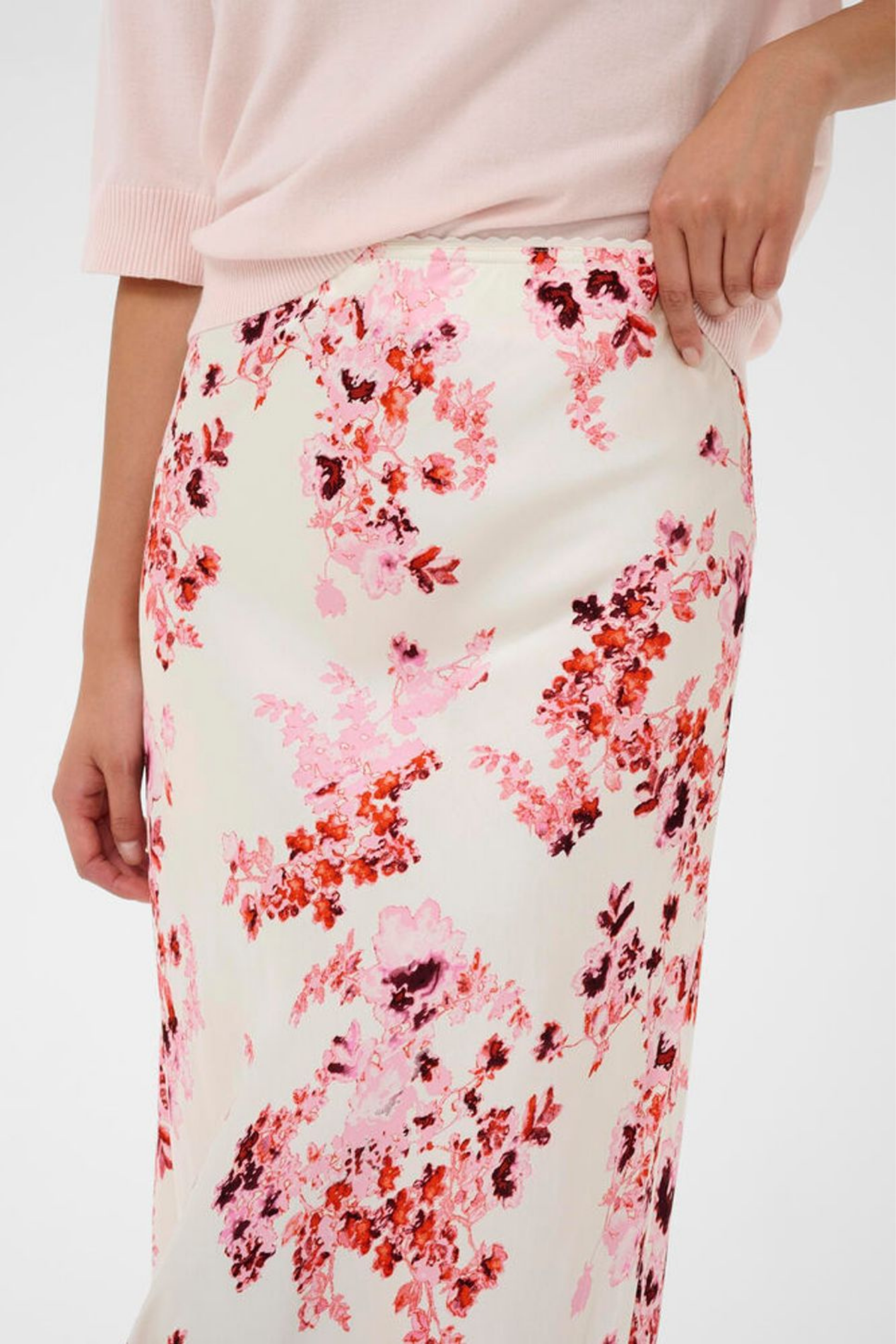 Elegant floral midi skirt by Part Two in pink shadow print. Soft, floaty and easy to style for everyday or occasion wear.