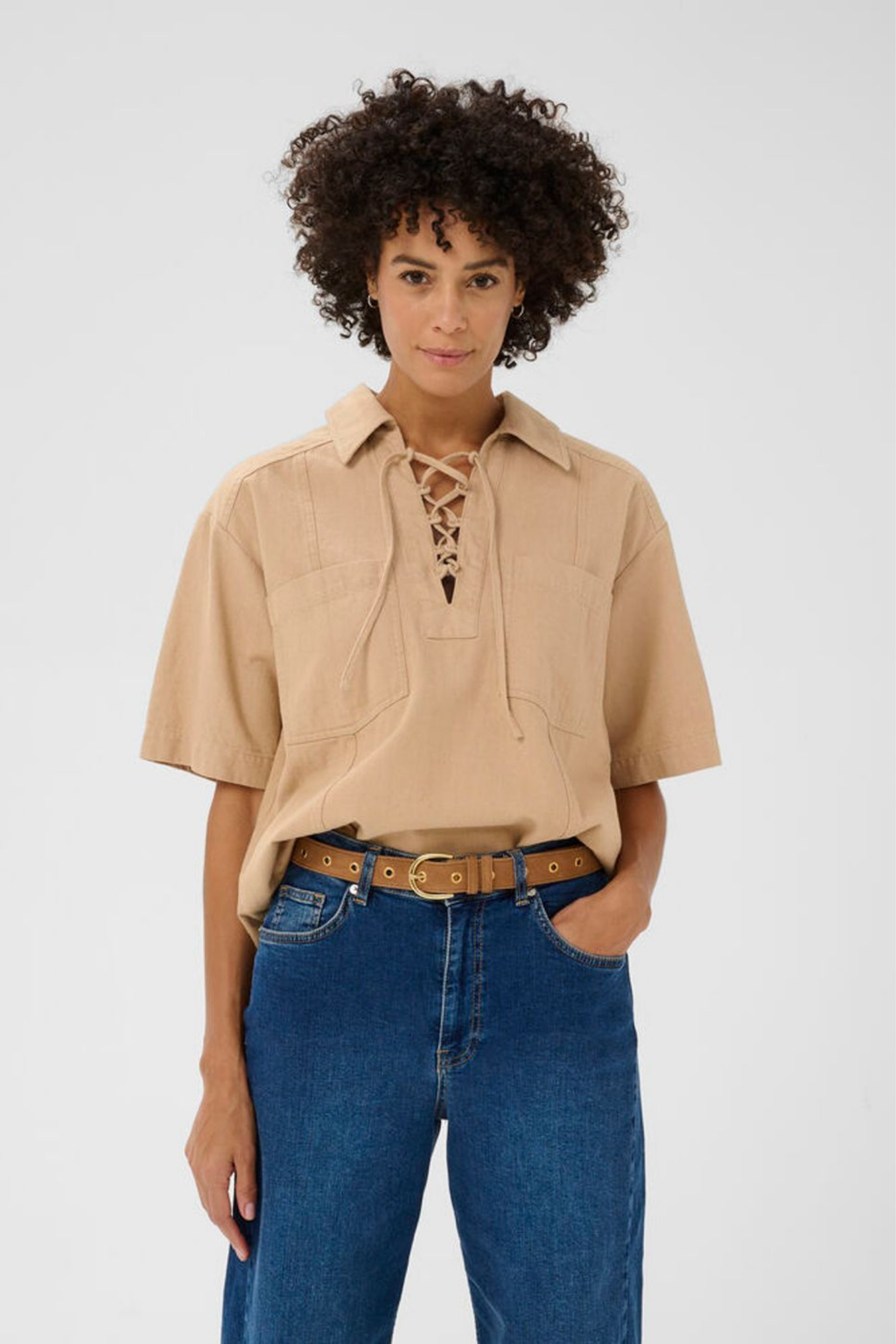 Suede leather belt by Part Two in toasted coconut with metal stud detailing. Easy to style with jeans or dresses. Shop now at Dotique.