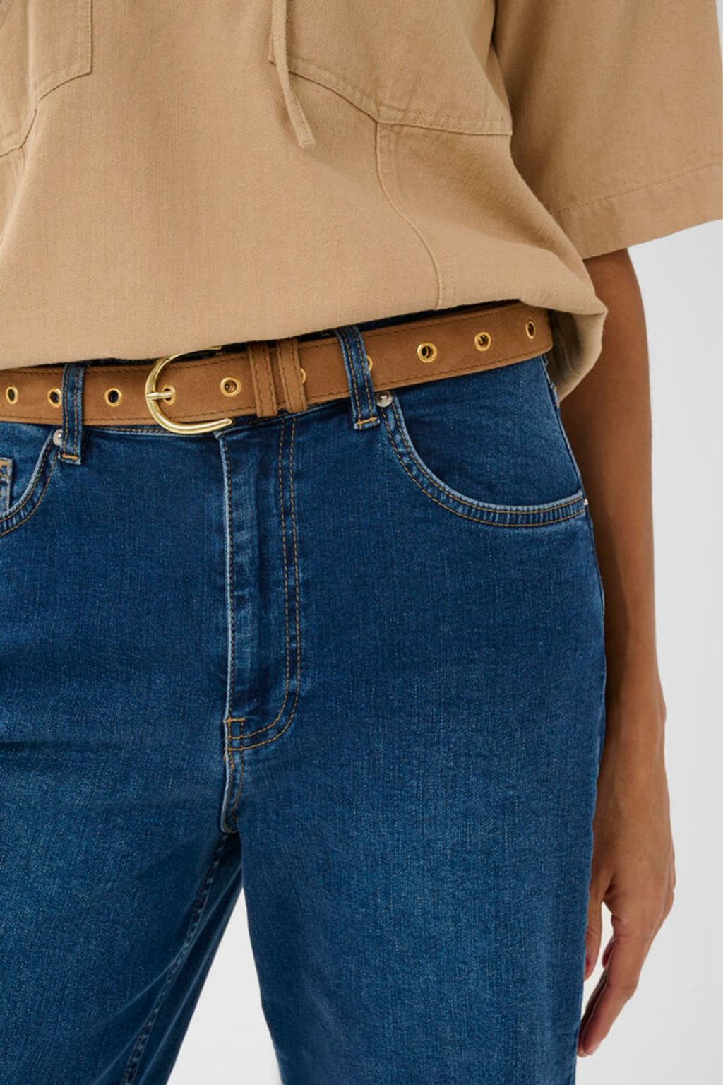 Suede leather belt by Part Two in toasted coconut with metal stud detailing. Easy to style with jeans or dresses. Shop now at Dotique.