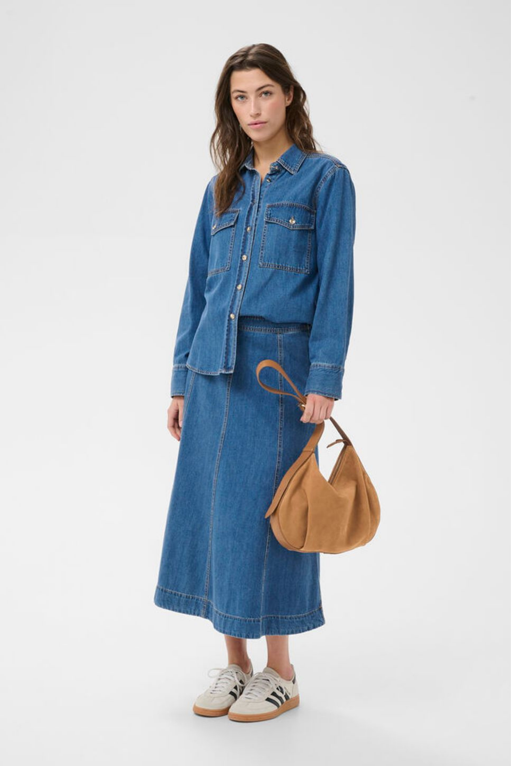 Soft suede shoulder bag by Part Two in toasted coconut with adjustable strap and zip closure. A timeless everyday bag. Shop at Dotique.