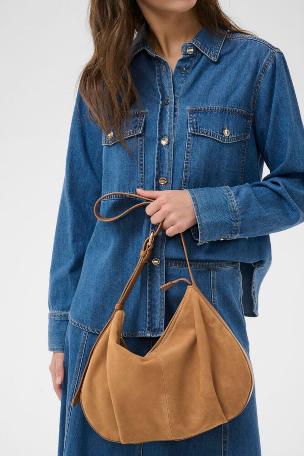 Soft suede shoulder bag by Part Two in toasted coconut with adjustable strap and zip closure. A timeless everyday bag. Shop at Dotique.