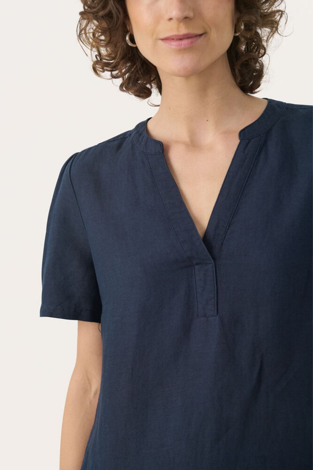 Relaxed linen blend dress by Part Two in after midnight with V-neck and short sleeves. Easy summer style. Shop at Dotique.