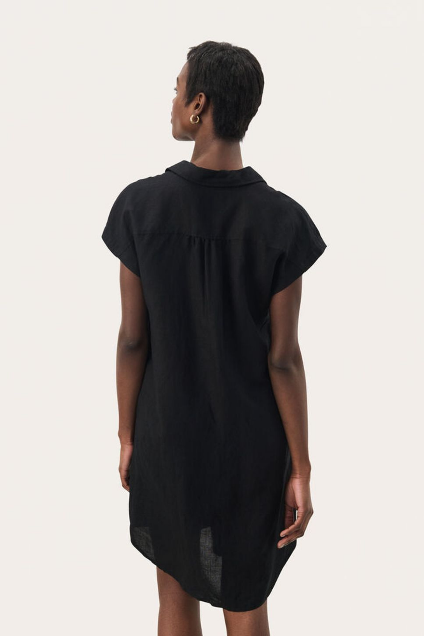 Timeless black linen shirt dress by Part Two. Lightweight, breathable and easy to style for summer days and holidays.