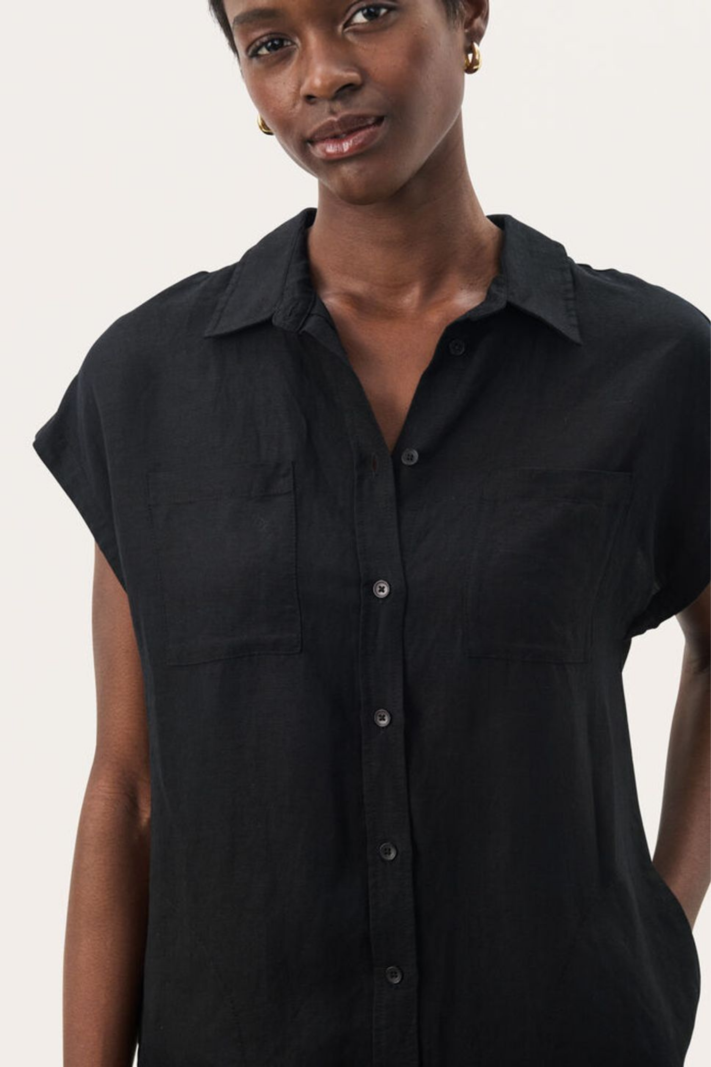 Timeless black linen shirt dress by Part Two. Lightweight, breathable and easy to style for summer days and holidays.