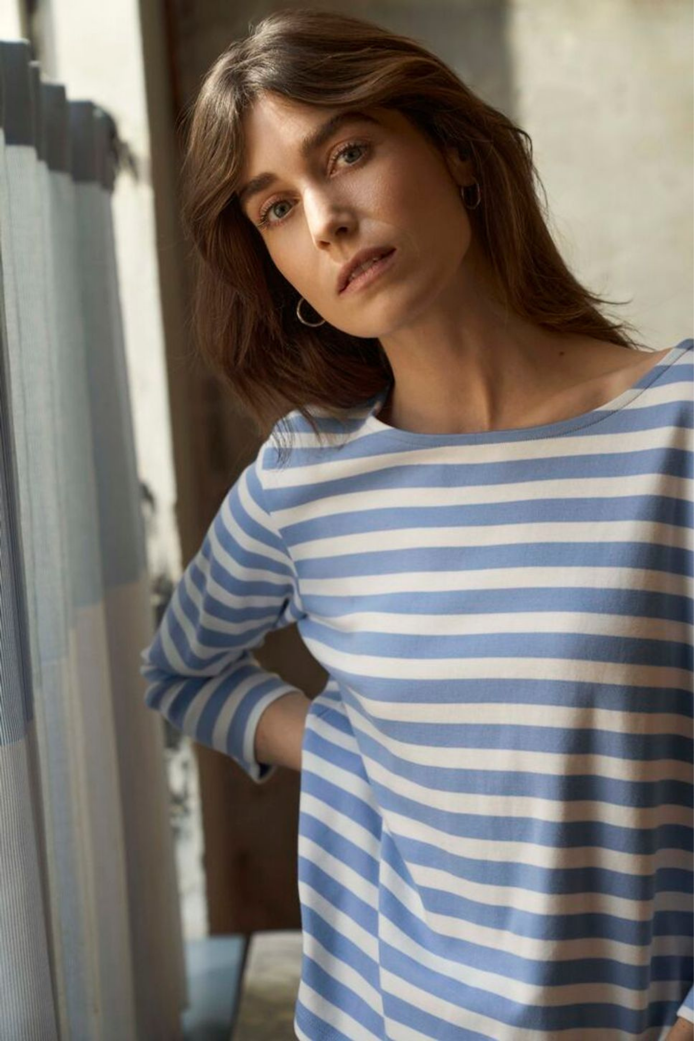 Woman wearing a blue and white striped Part Two 30309864 NelaPW Hydrangea Stripe T-shirt by Part Two Shop the Part Two collection at Dotique
