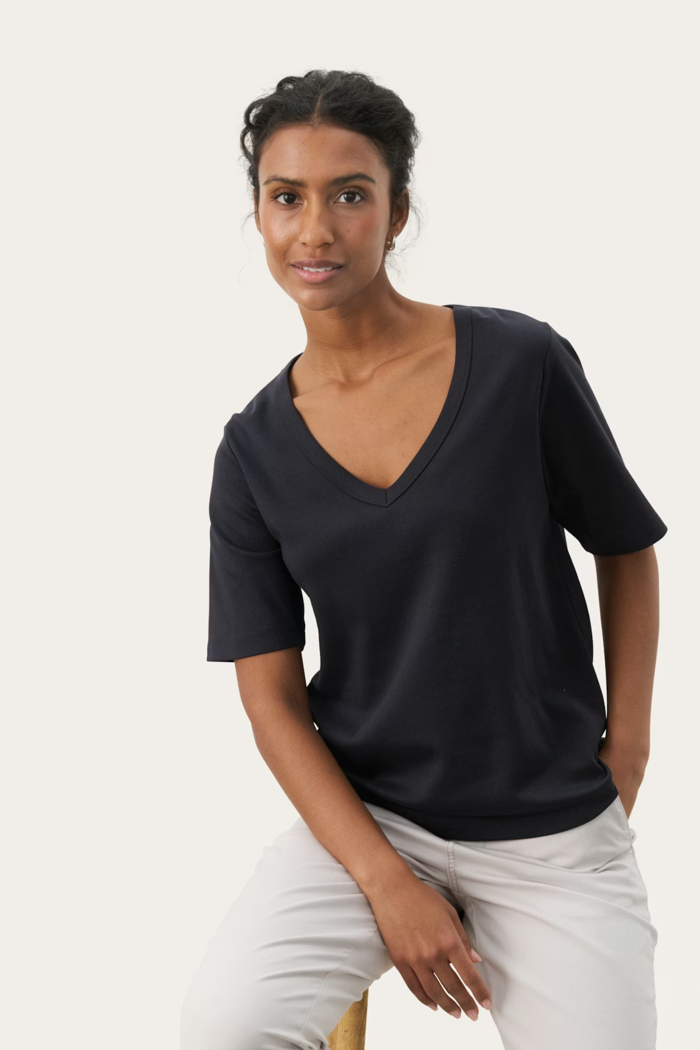 Soft organic cotton V-neck T-shirt by Part Two in Dark Navy. A timeless wardrobe staple with a classic fit, perfect for everyday wear. Shop Dotique.