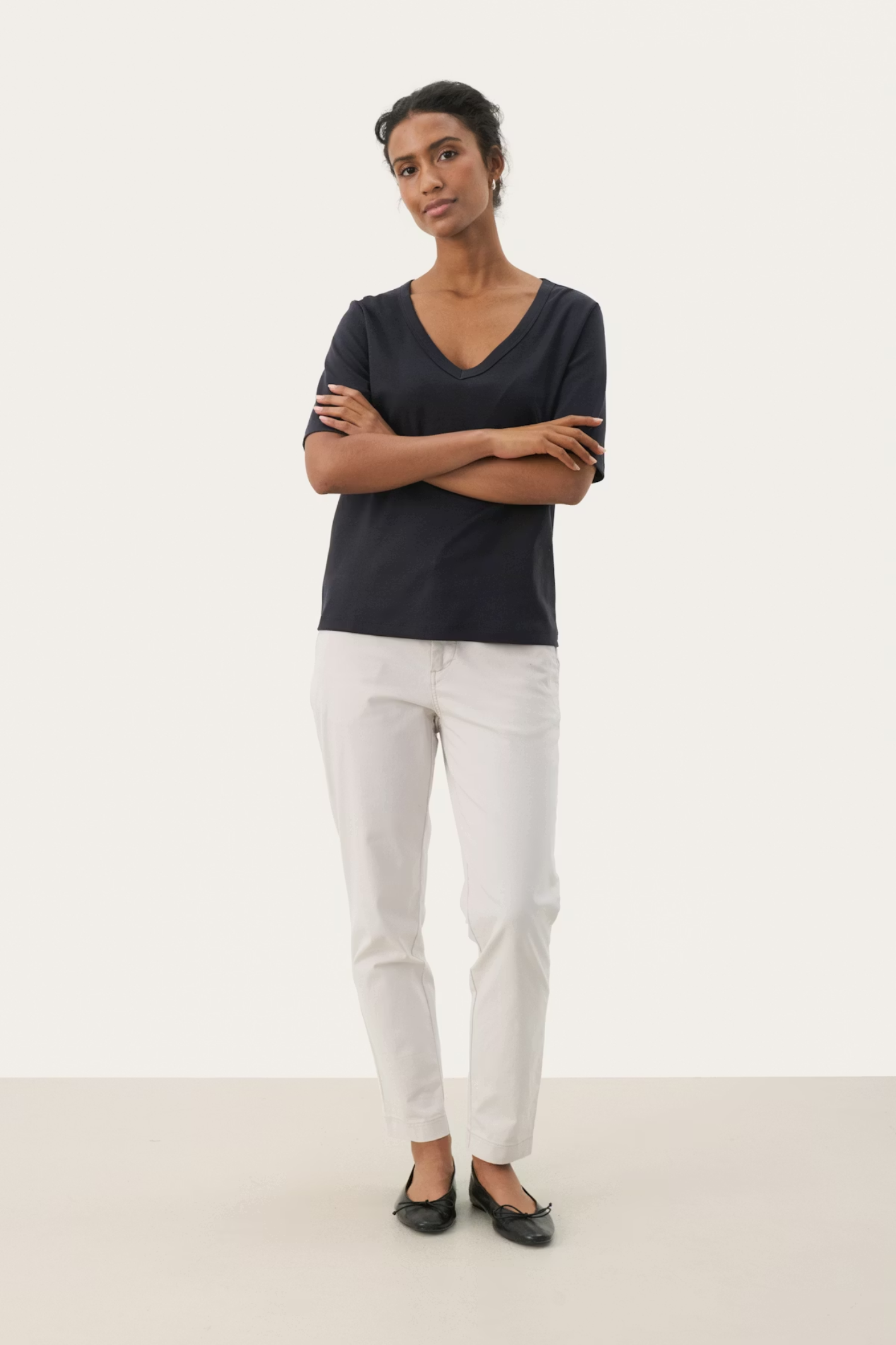 Soft organic cotton V-neck T-shirt by Part Two in Dark Navy. A timeless wardrobe staple with a classic fit, perfect for everyday wear. Shop Dotique.