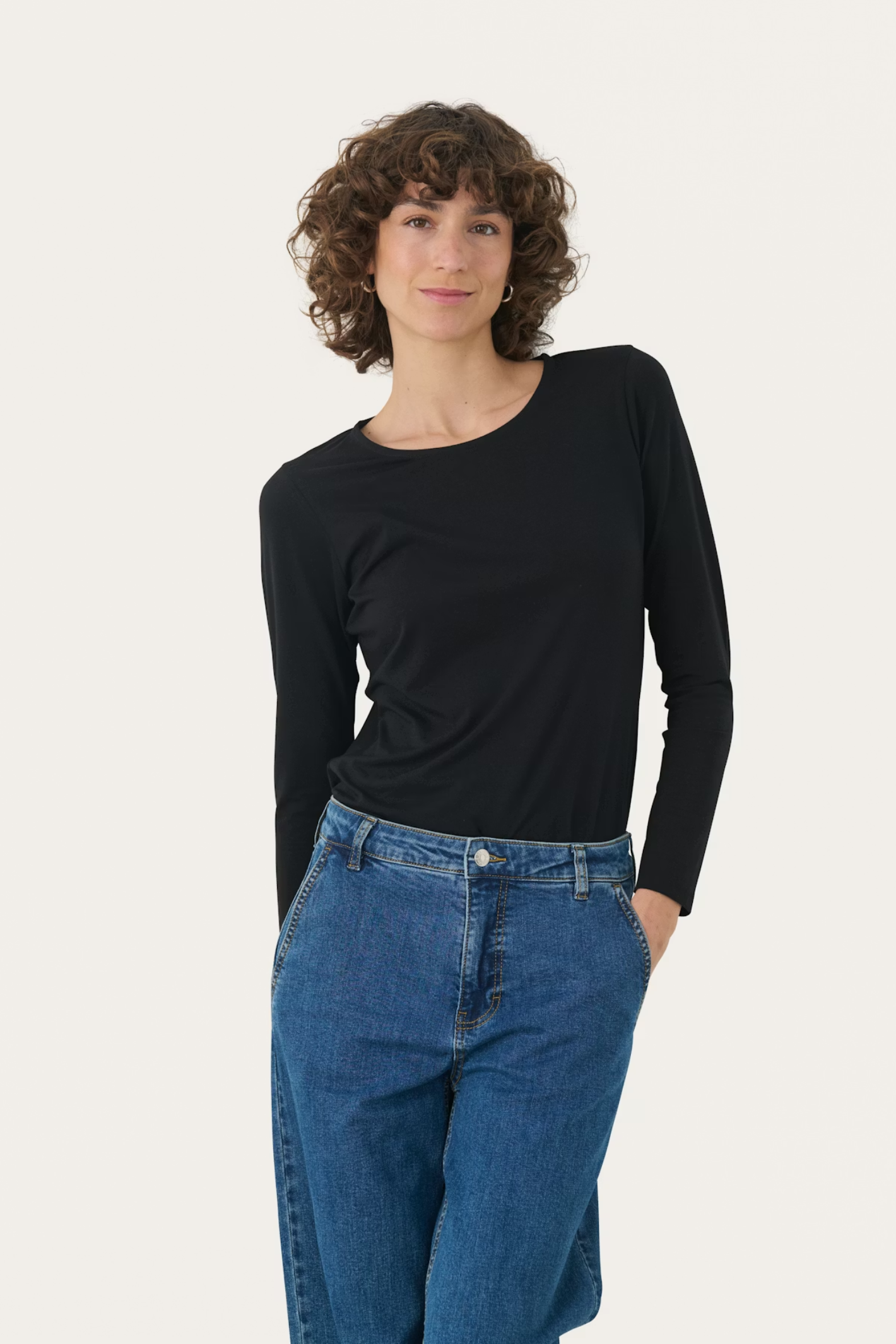 Soft long sleeve T-shirt by Part Two in black. Made with TENCEL™ Modal and organic cotton for a smooth, flattering fit. Shop Dotique.