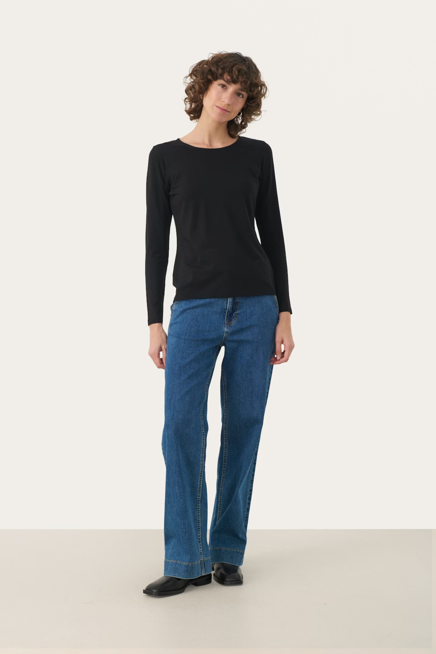 Soft long sleeve T-shirt by Part Two in black. Made with TENCEL™ Modal and organic cotton for a smooth, flattering fit. Shop Dotique.