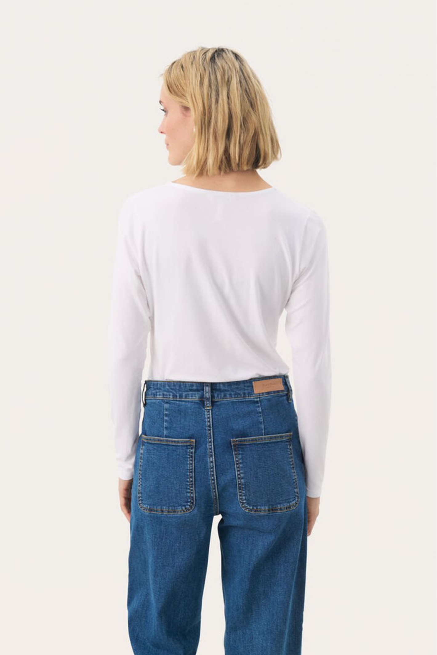 Bright white long sleeve T-shirt by Part Two. Made with TENCEL™ Modal and organic cotton for a soft, flattering everyday fit. Shop Dotique.