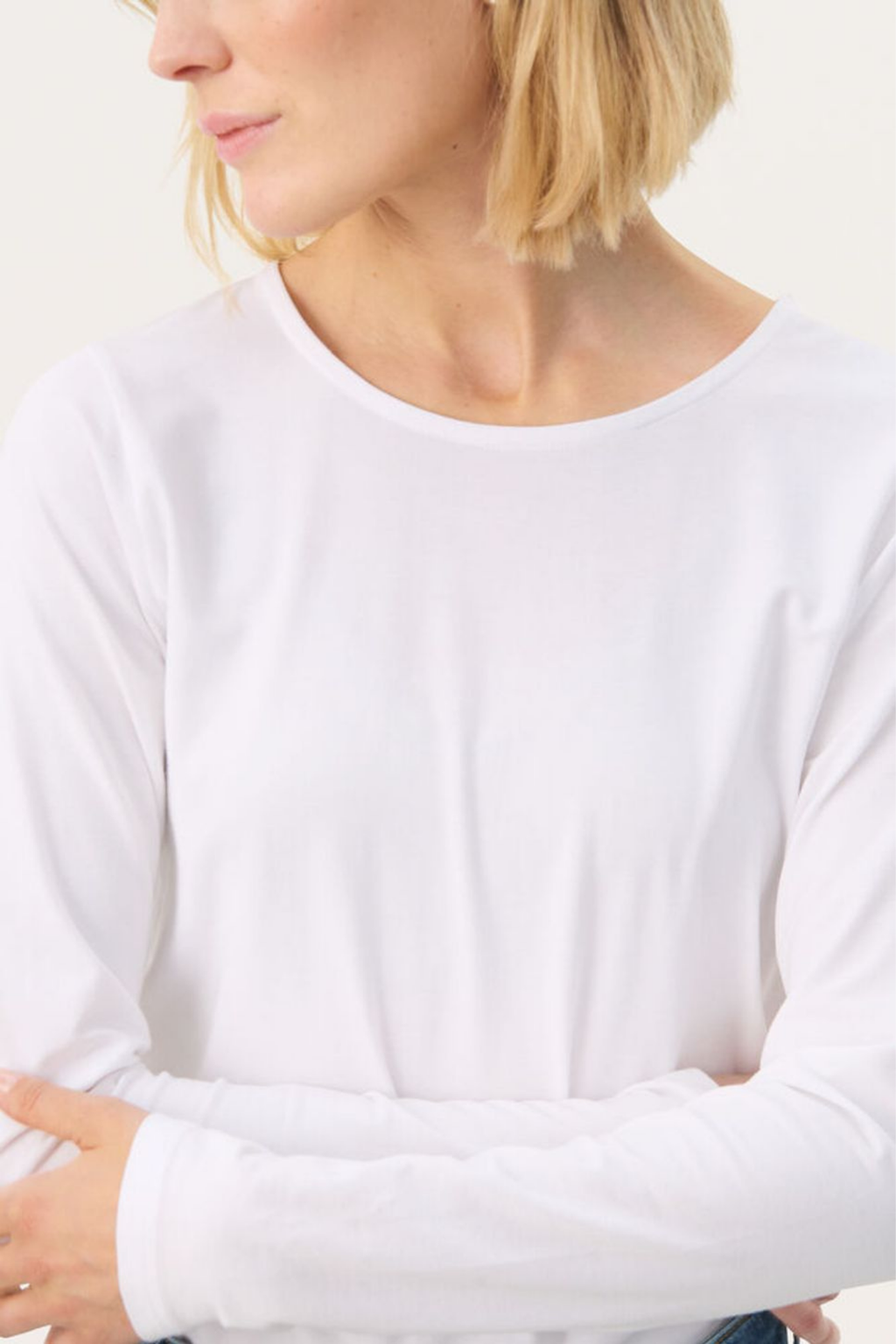 Bright white long sleeve T-shirt by Part Two. Made with TENCEL™ Modal and organic cotton for a soft, flattering everyday fit. Shop Dotique.