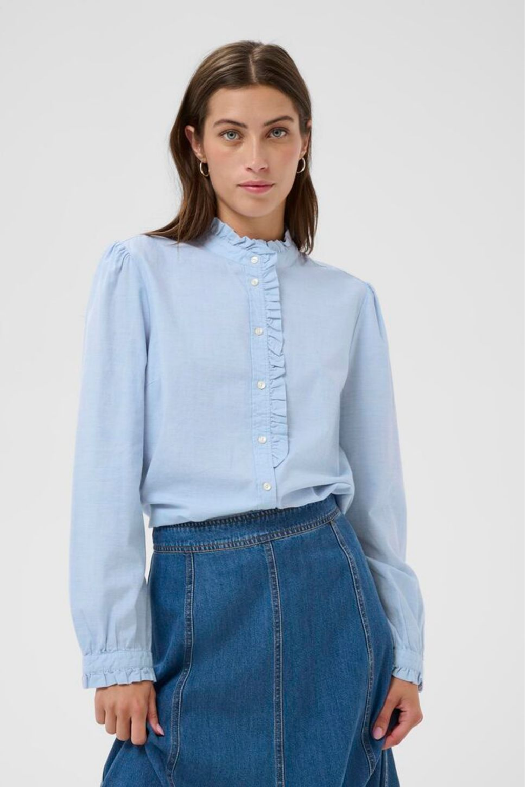 Light blue ruffle detail shirt by Part Two, made from 100% organic cotton. A feminine, easy-to-wear style for everyday or dressed-up looks. Shop Dotique.