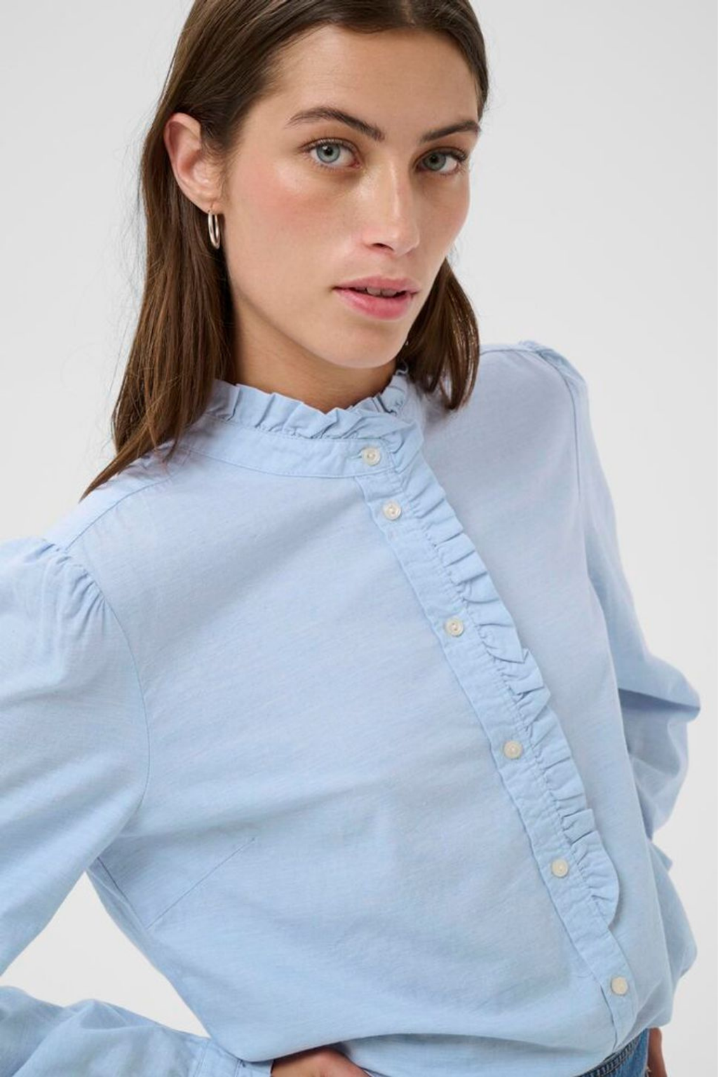 Light blue ruffle detail shirt by Part Two, made from 100% organic cotton. A feminine, easy-to-wear style for everyday or dressed-up looks. Shop Dotique.