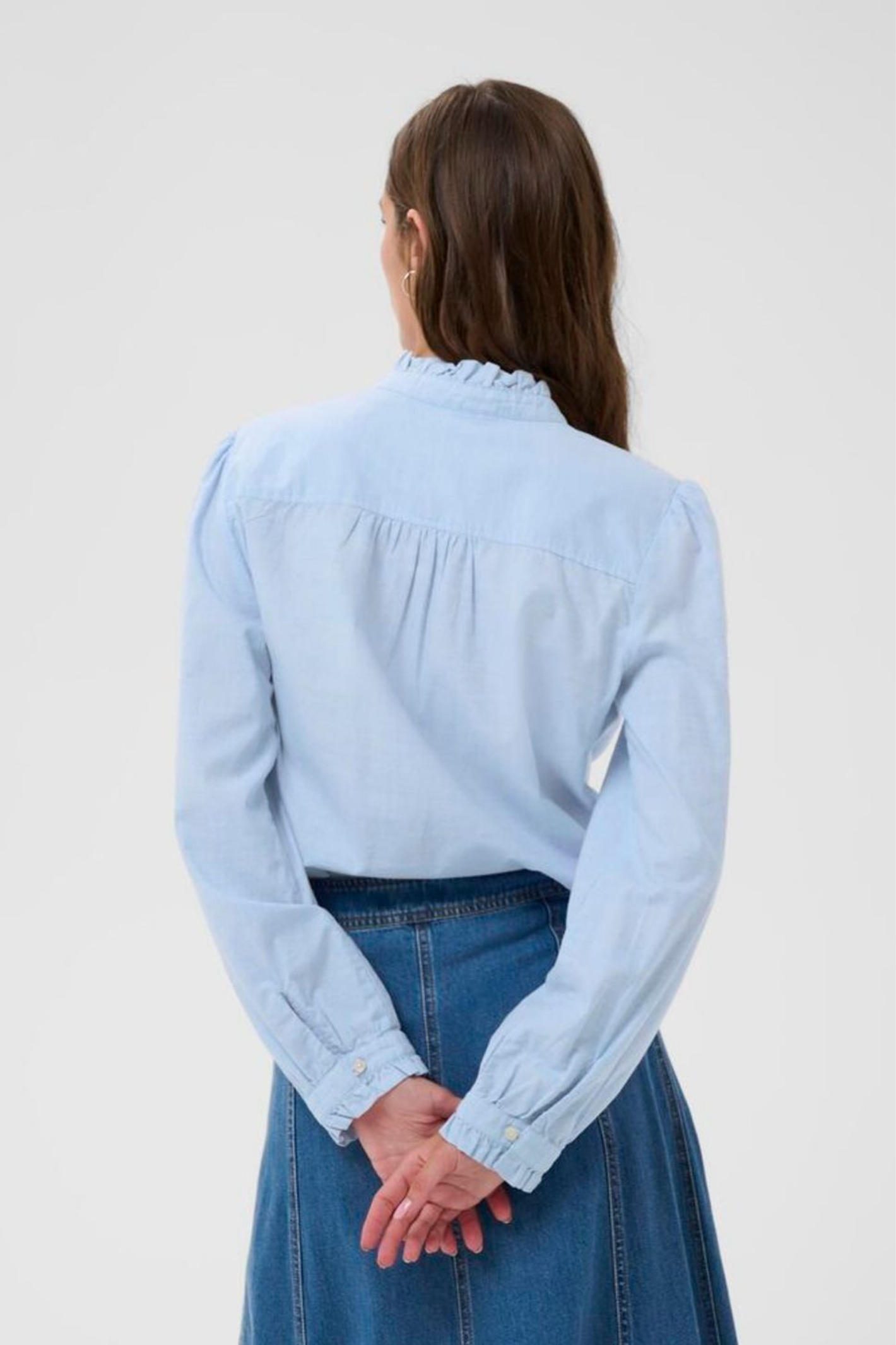 Light blue ruffle detail shirt by Part Two, made from 100% organic cotton. A feminine, easy-to-wear style for everyday or dressed-up looks. Shop Dotique.