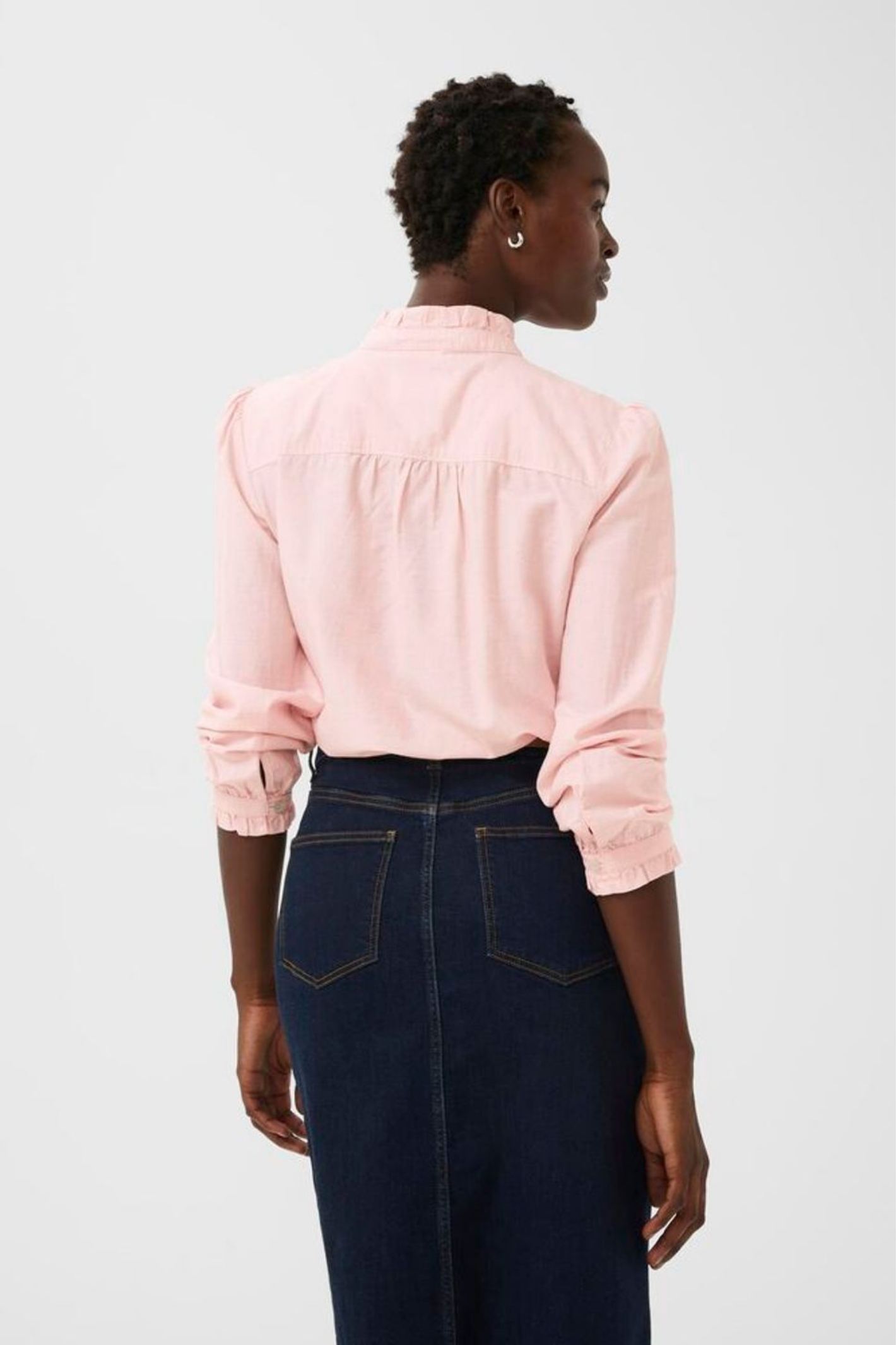 Soft rose chambray shirt by Part Two with delicate ruffle detailing. Made from 100% organic cotton and easy to style for everyday wear. Shop Dotique.