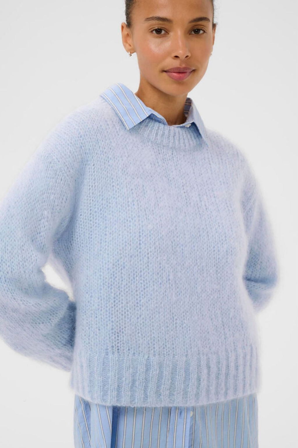 Soft mohair-blend jumper by Part Two in a calming heather blue. Lightweight, cosy and easy to style for everyday wear. Shop now at Dotique.