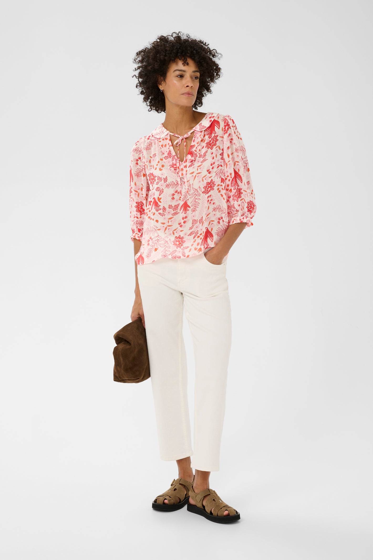 Model wearing Part Two 30310377 AlviaPW Poppy Red Bird Print Blouse styled with cream trousers shop Part Two at Dotique