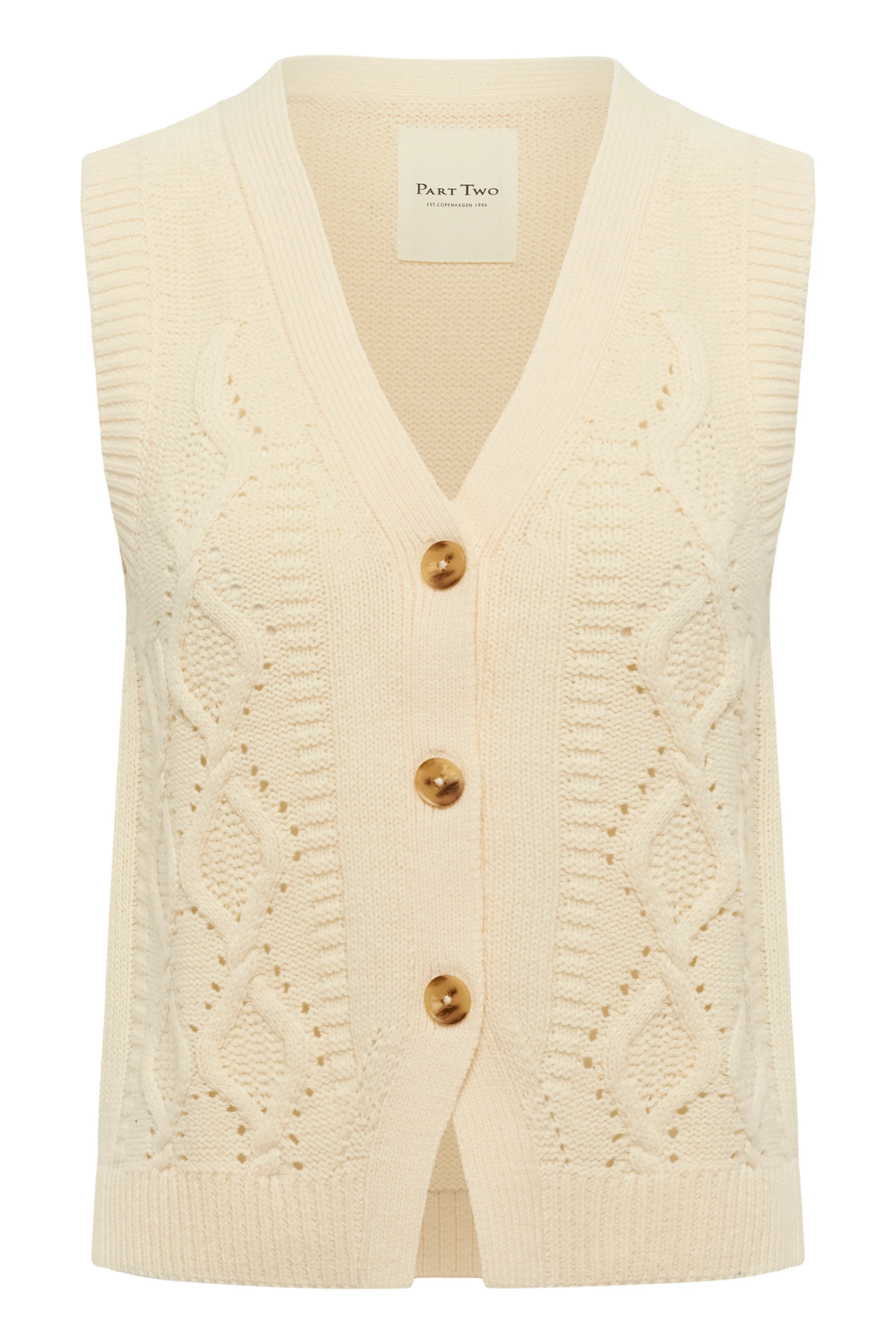 Model wearing the Part Two ChristinPW cream cable knit button-through waistcoat. Shop Part Two at Dotique.
