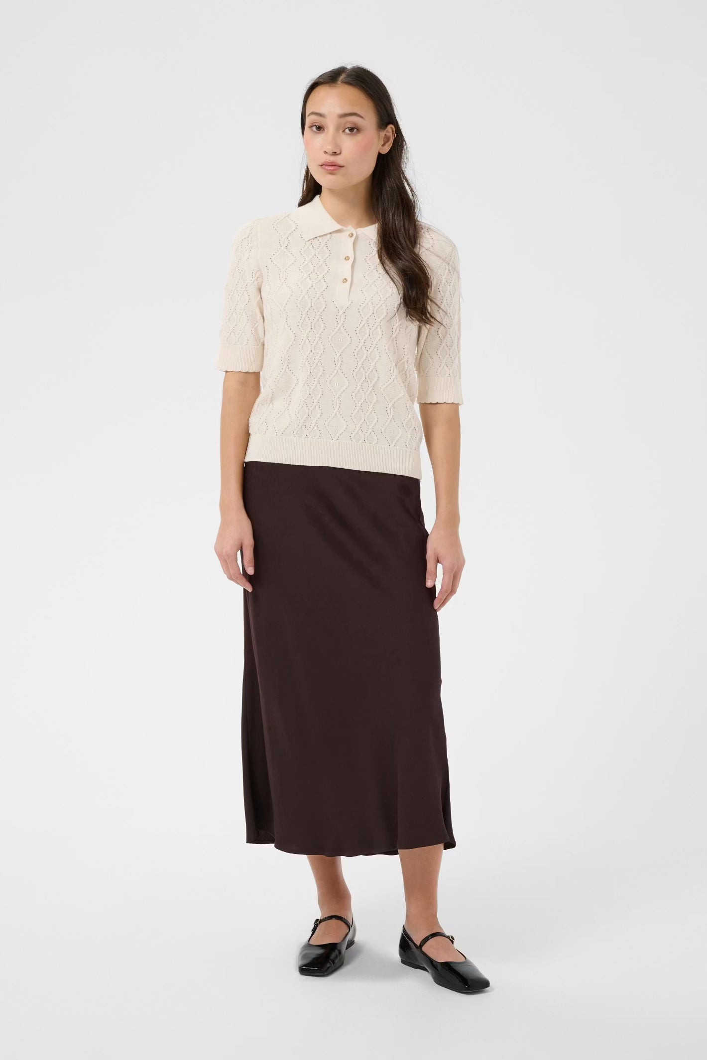 Shop the Part Two CiniaPW Knitted Jumper in French Oak Melange at Dotique. A soft relaxed-fit knit with a timeless crew neck, perfect for effortless everyday style.